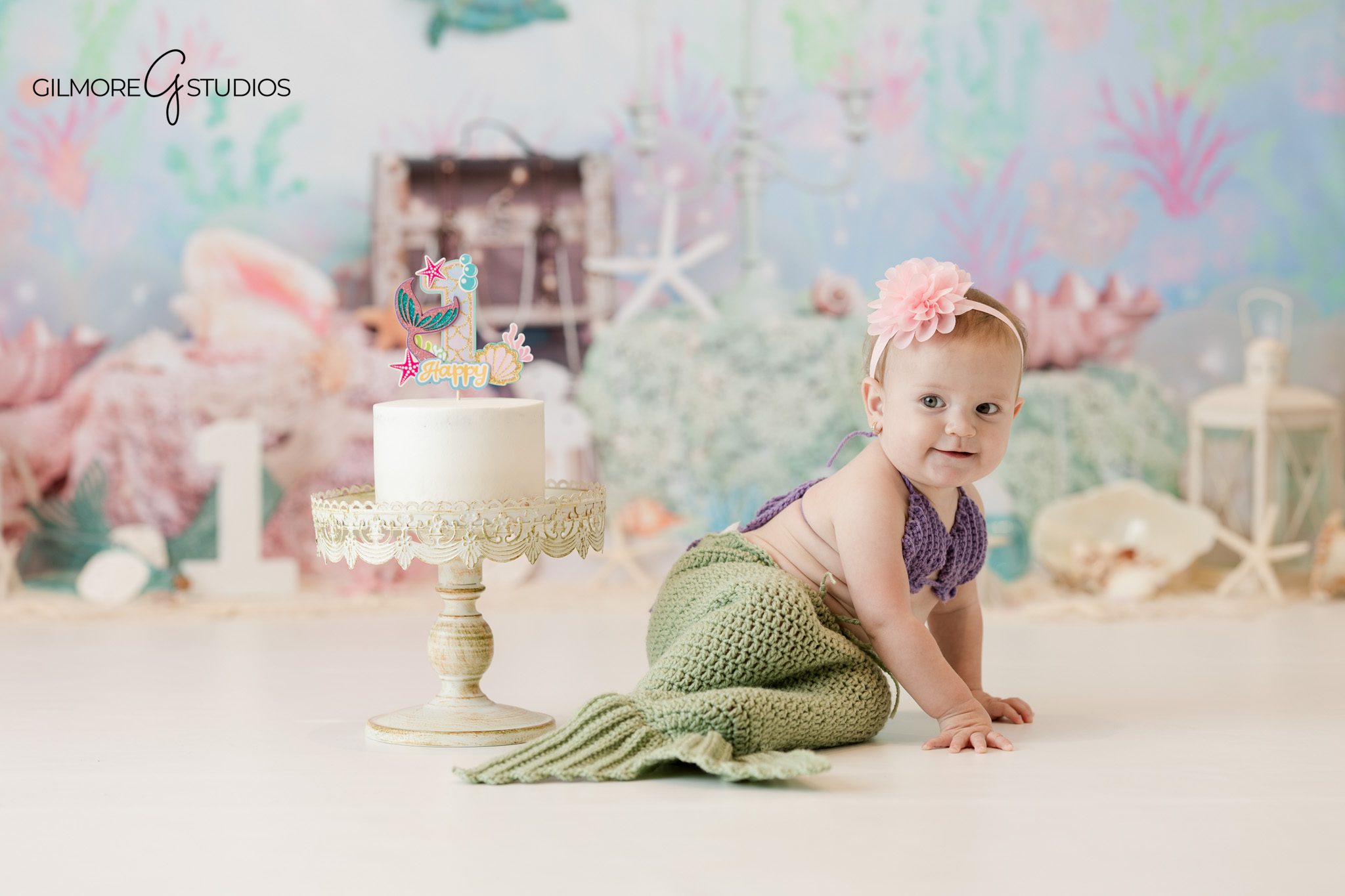 Baby milestone portrait photographed by professional photographer

Cake smash portrait photography capturing playful baby moment