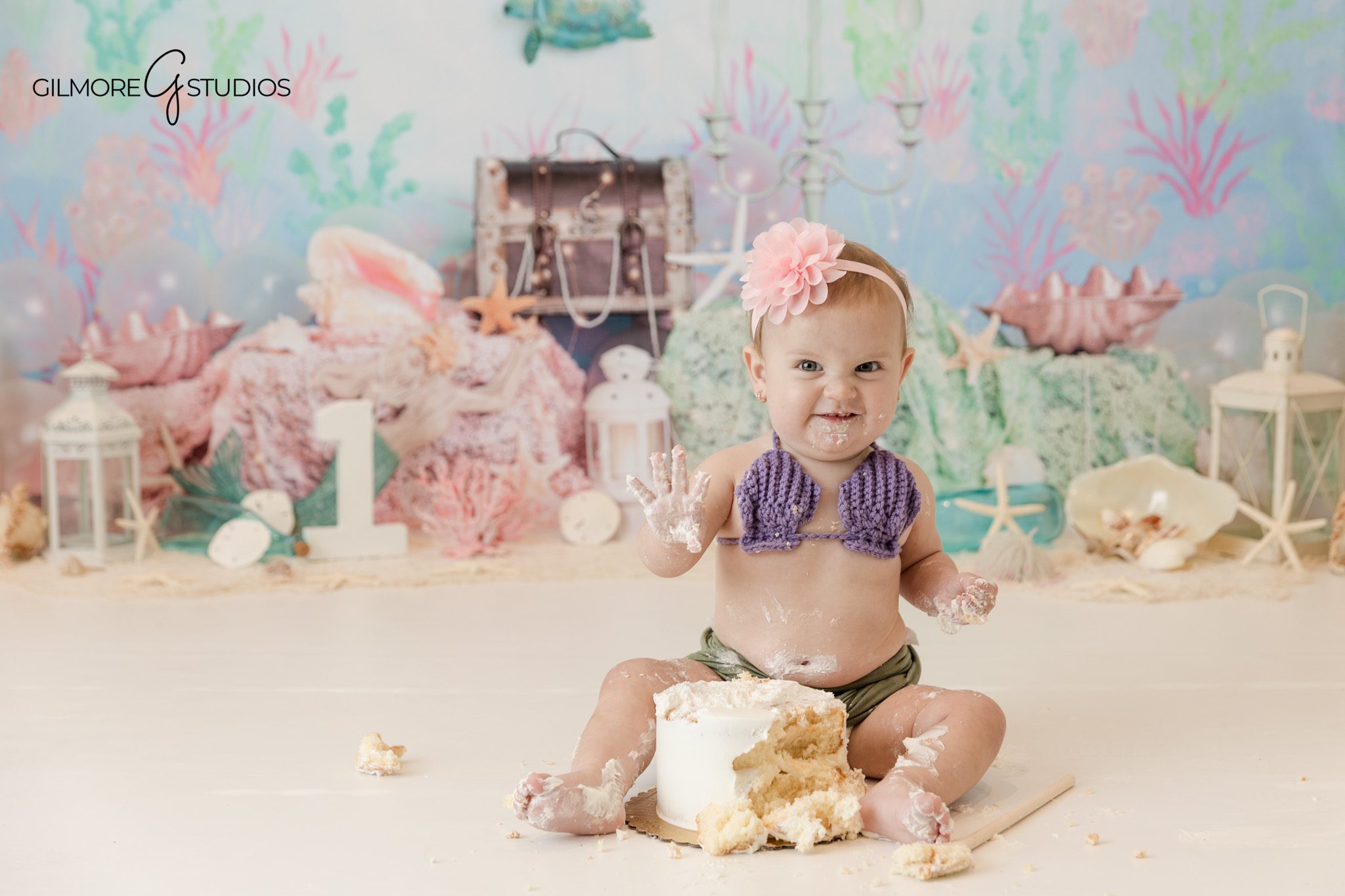 Baby portrait photography capturing playful milestone moment

Baby milestone photography portrait celebrating first birthday