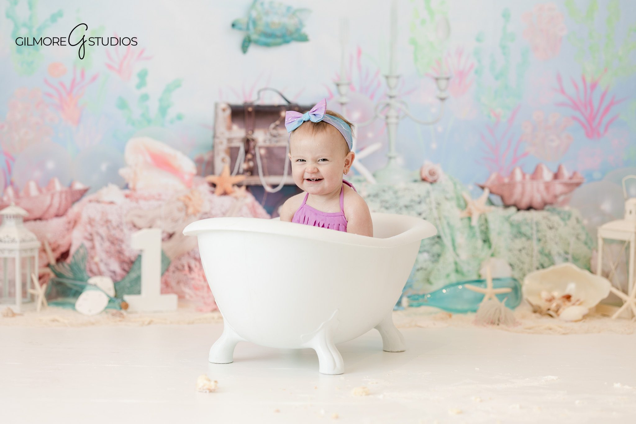 Cake smash portrait photography showing baby exploring cake

Baby portrait photography capturing natural baby expressions