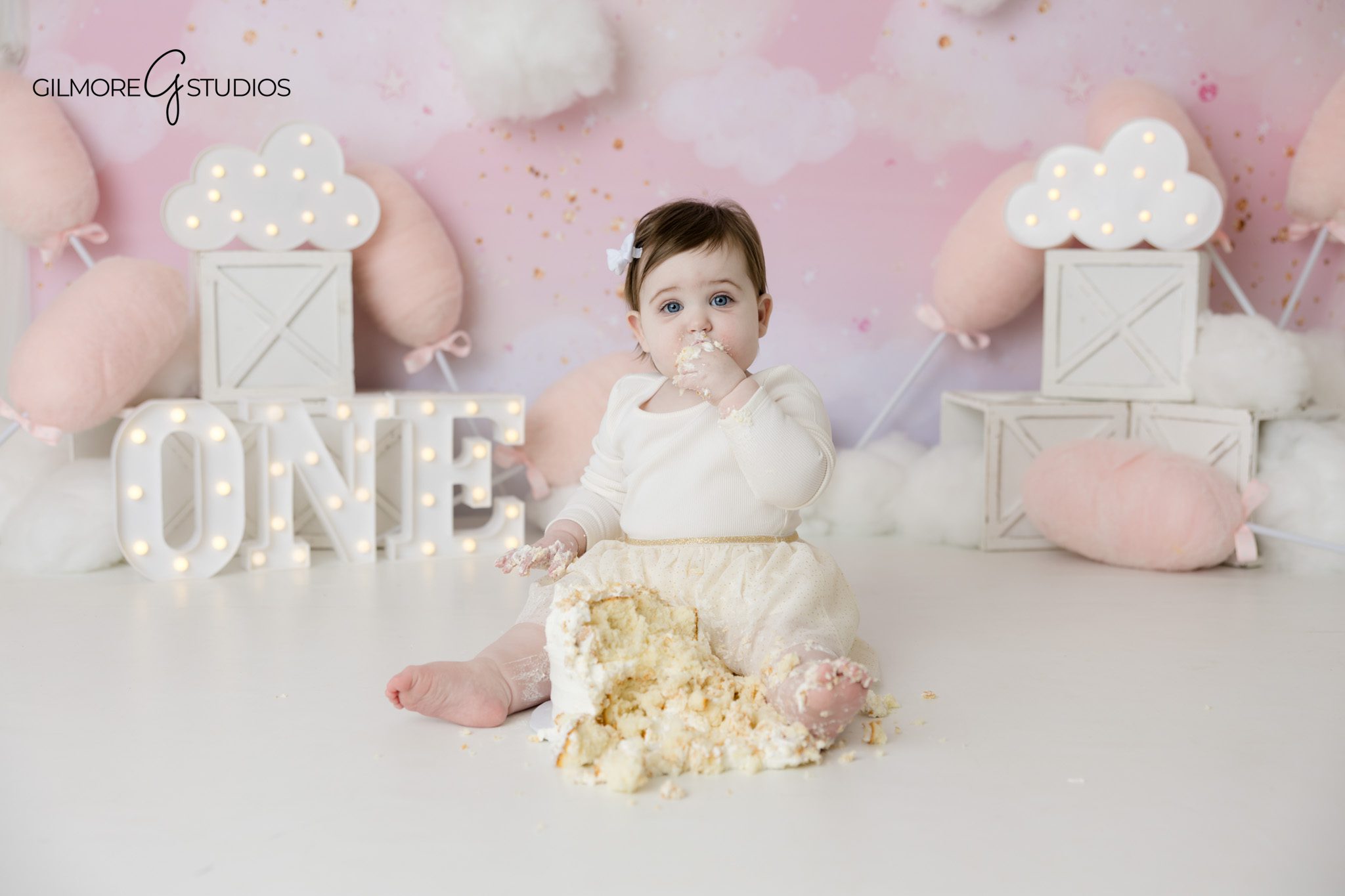 Professional baby portrait photography during cake smash

Baby milestone portrait photography with birthday cake