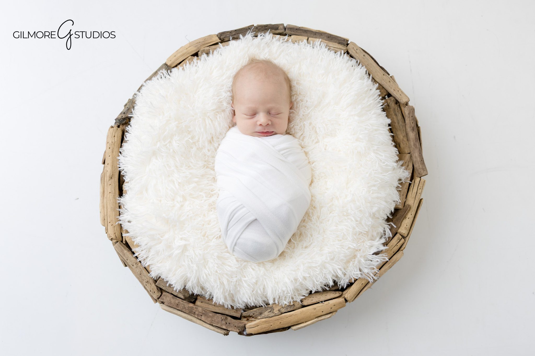 Newborn baby portrait photography session

Sleeping newborn portrait photographed in studio
