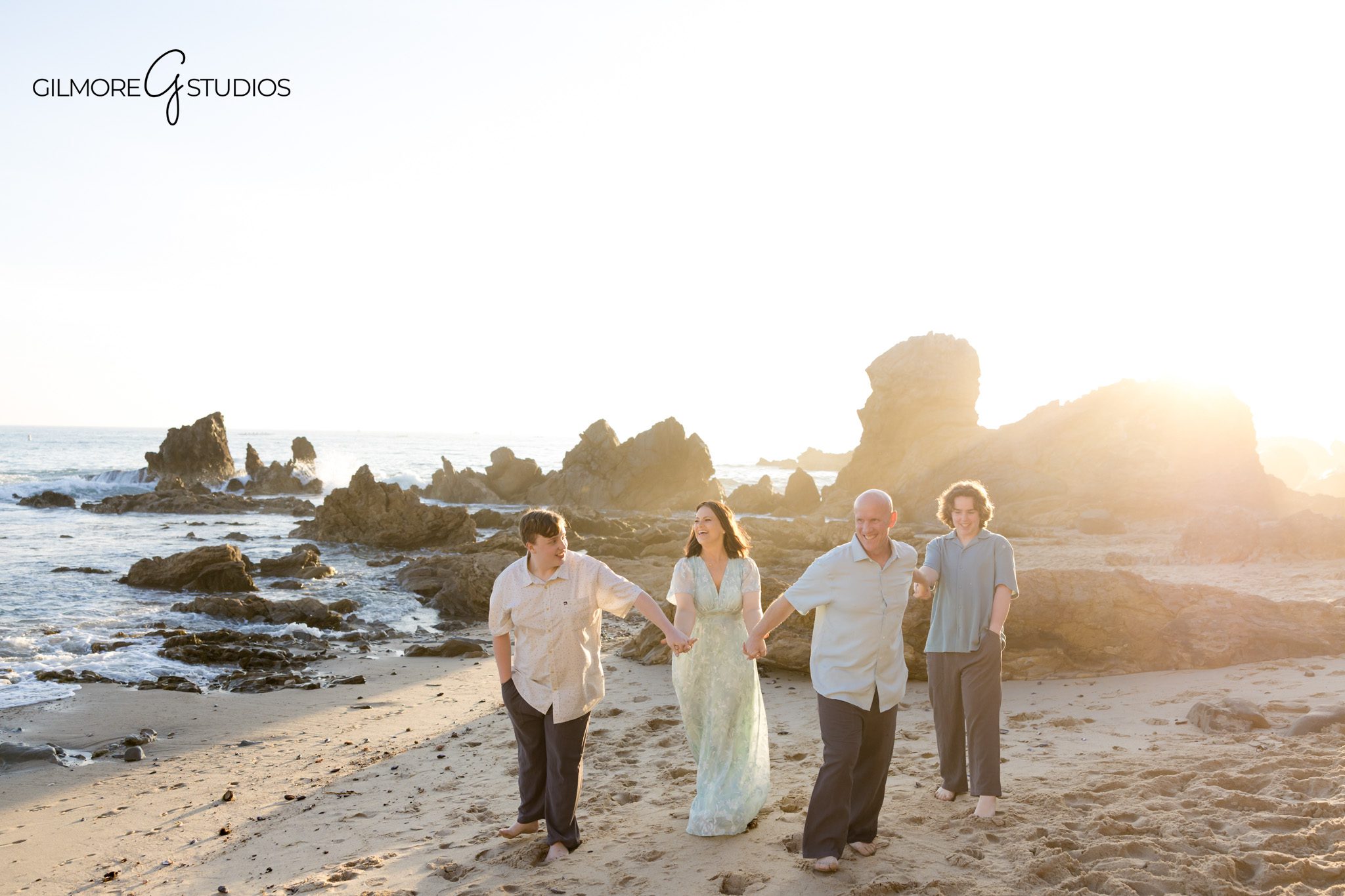 engagement photographer Newport Beach documenting family connection
Newport Beach portrait photography with kids playing on the beach