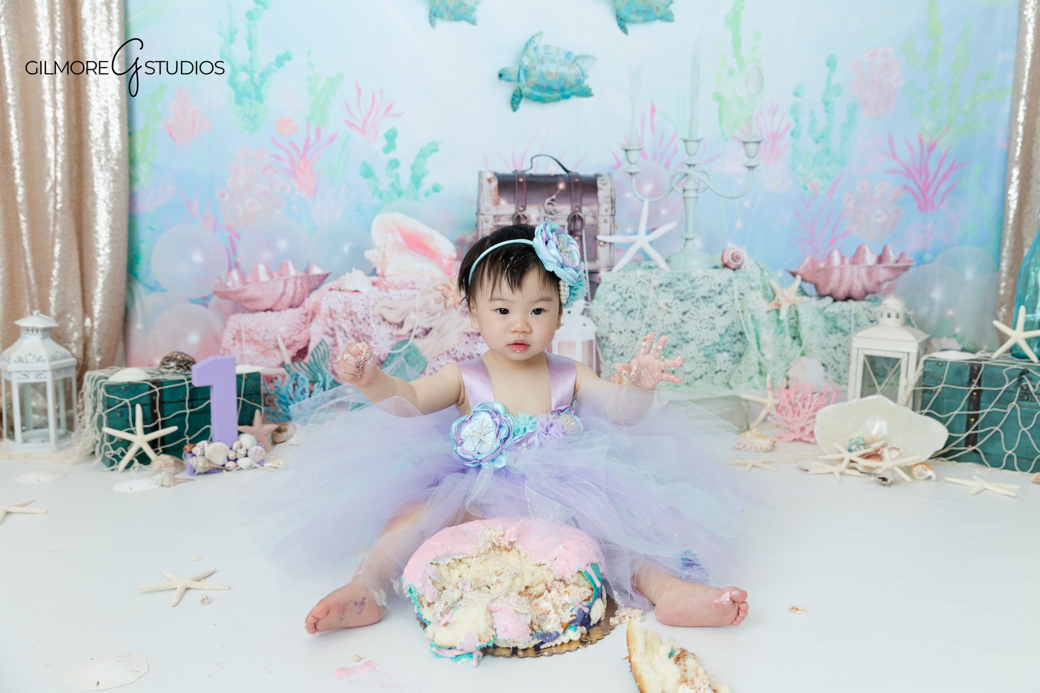 baby portrait photography playful cake smash
orange county baby photographer first birthday cake smash