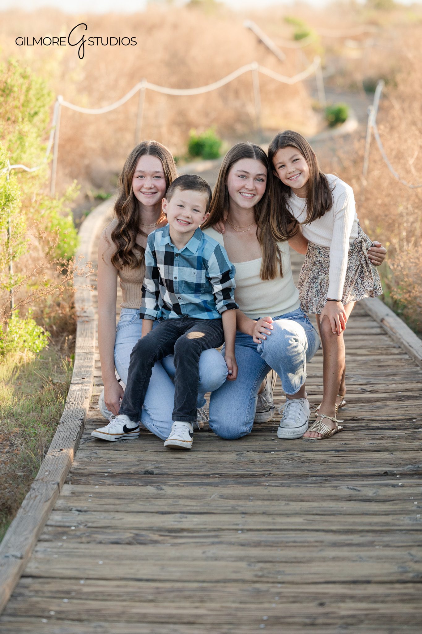 newport beach family photographer natural light family walking on trail
family photography session crystal cove with relaxed candid posing california