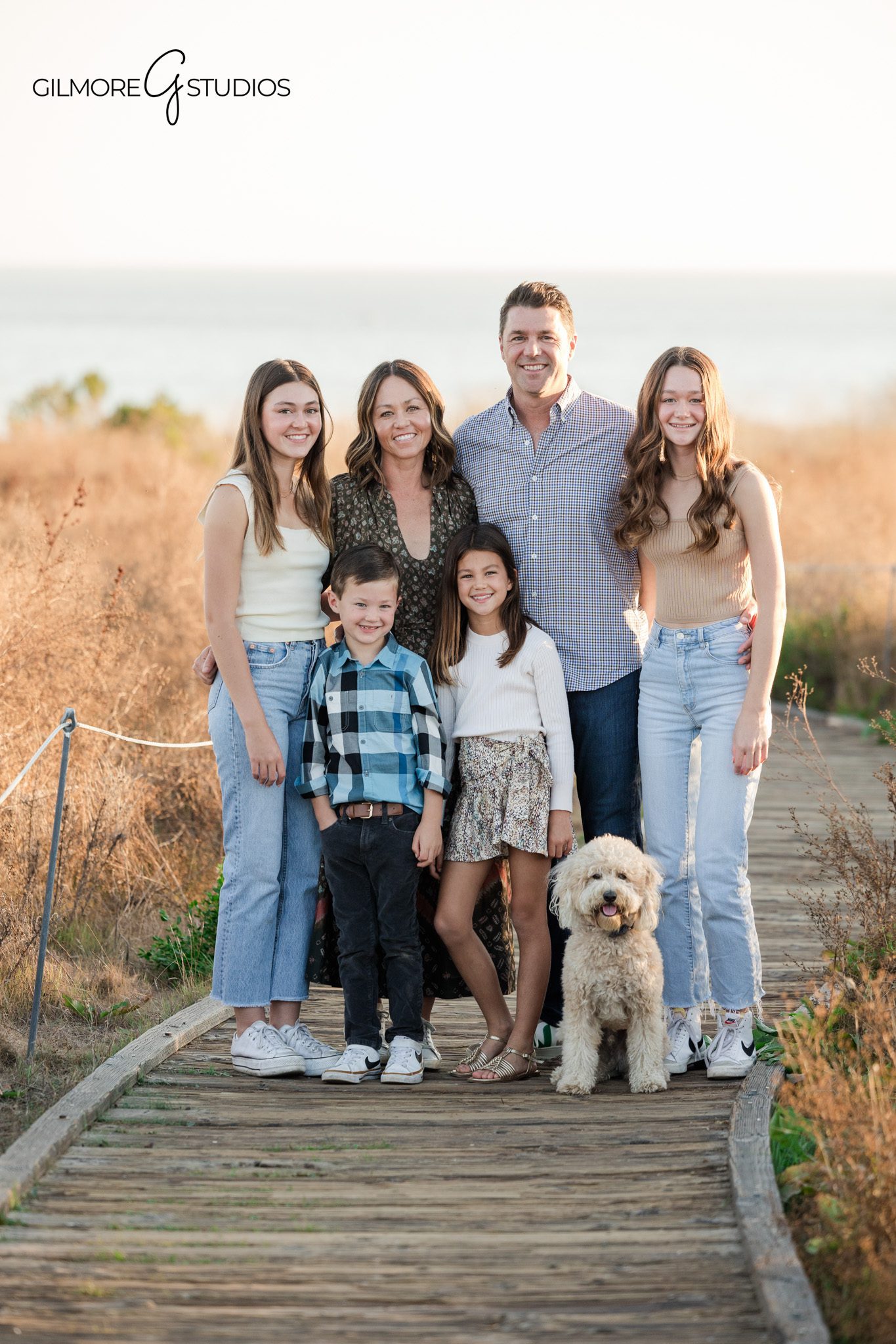 coastal california family photographer capturing natural light portraits
crystal cove family photography session with walking candid poses