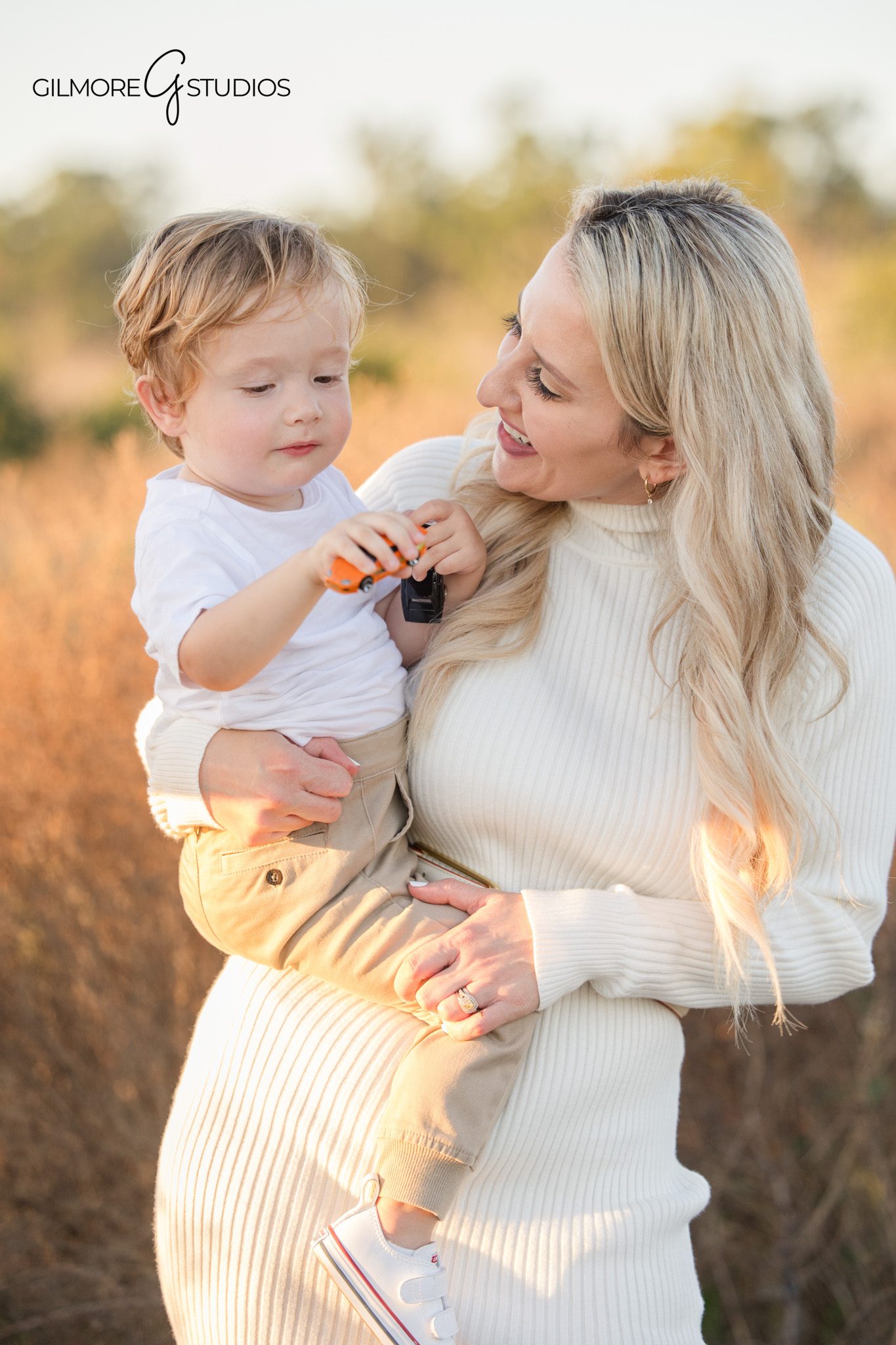family photography Crystal Cove walking portrait Newport Beach CA
Newport Beach CA family portrait photography toddler in parents arms