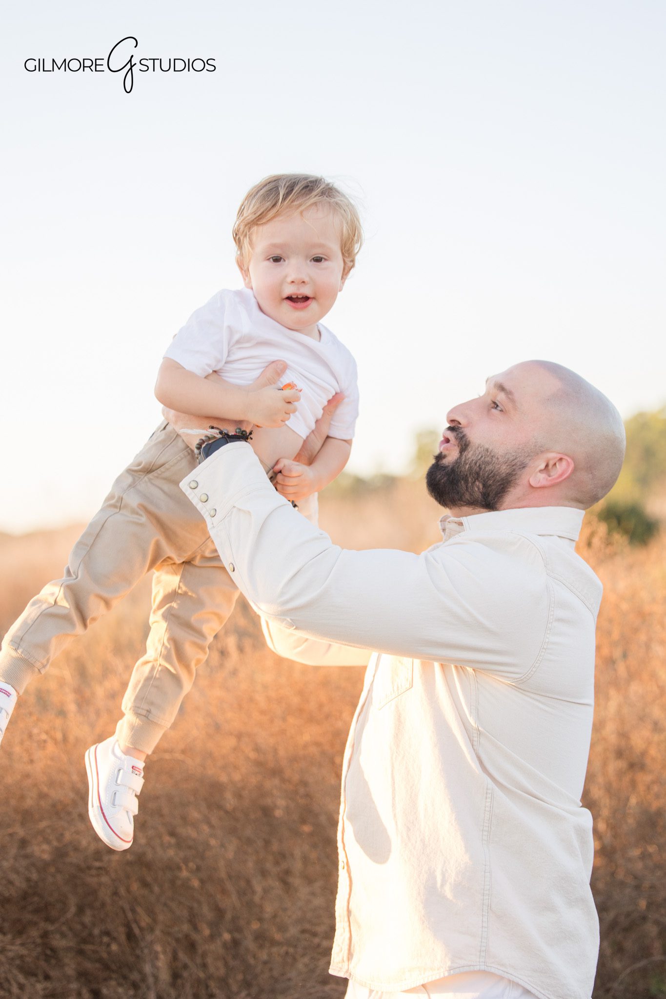 Crystal Cove Newport Beach family photographer walking boardwalk portrait
Newport Beach family photography full body portrait parents and child