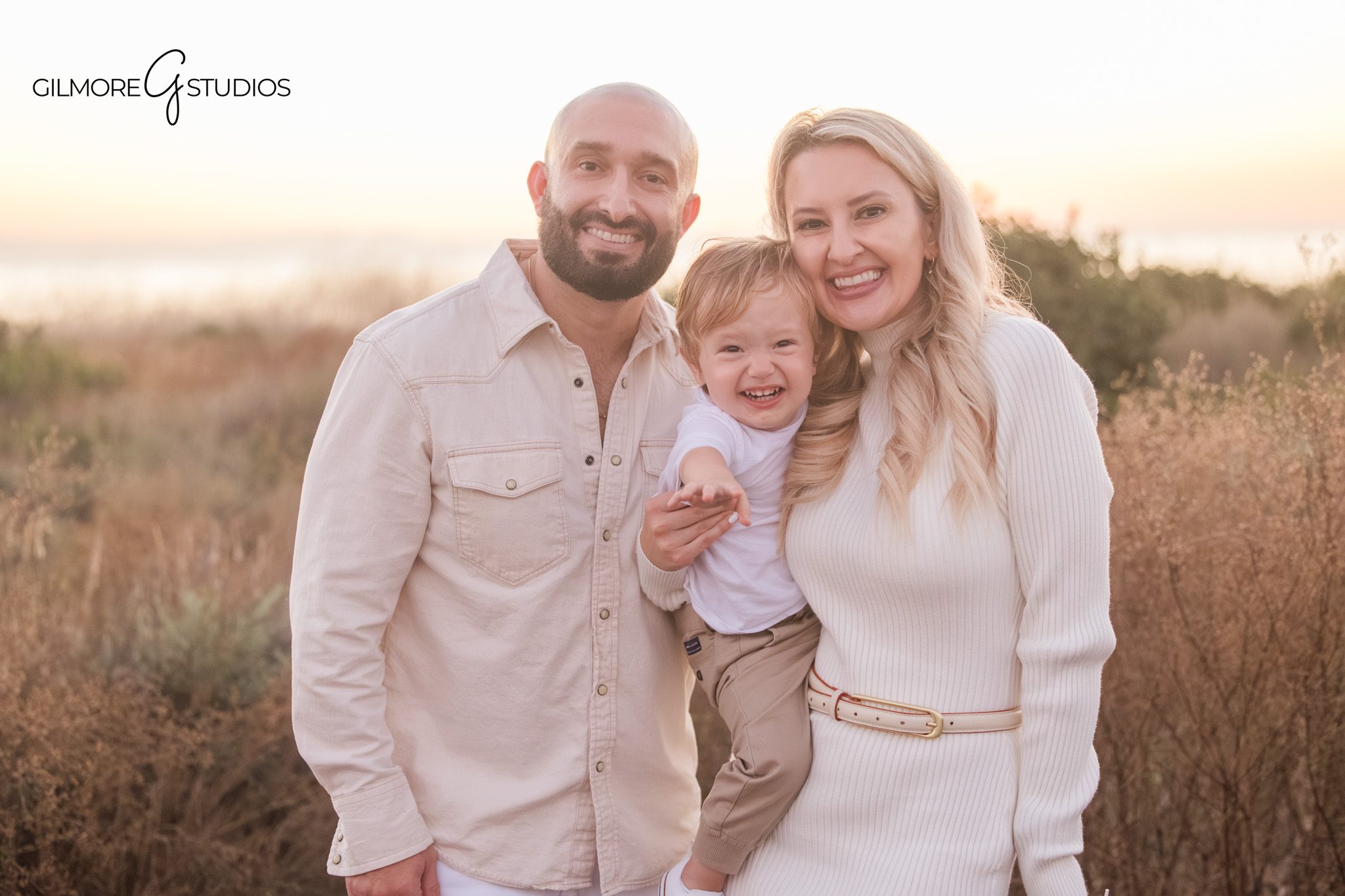 Newport Beach CA family portrait photography golden light session
family photography Newport Beach Crystal Cove parents and toddler portrait