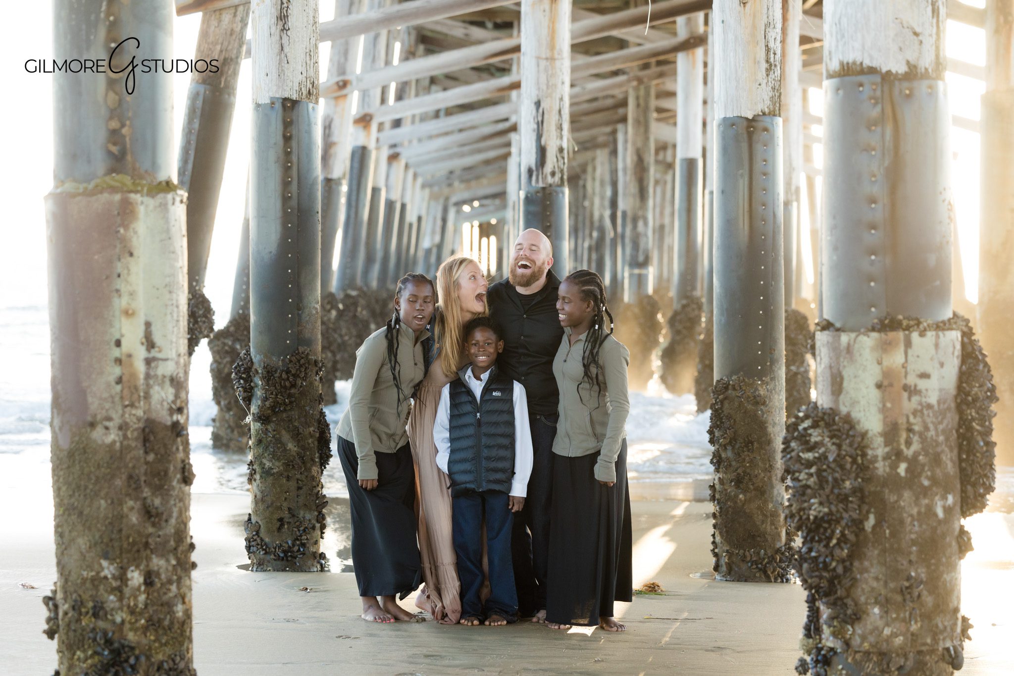 Newport Beach family portraits rocky beach Crystal Cove
Family session Crystal Cove Newport Beach soft sunset tones