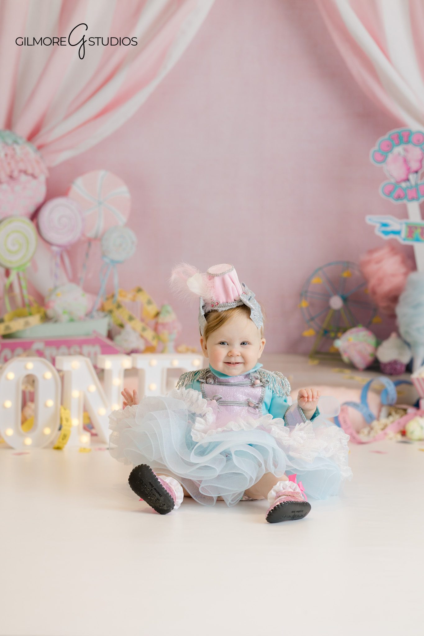 orange county cake smash photographer studio
baby girl photography carnival birthday theme