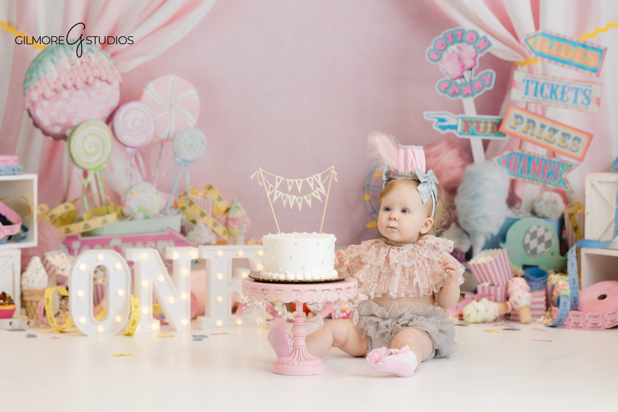 newborn and baby photographer california studio
cake smash photography colorful carnival backdrop