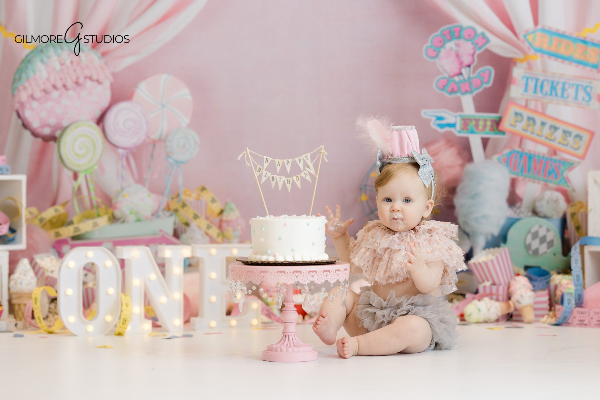 first birthday portrait carnival theme baby girl
cake smash session photographer orange county