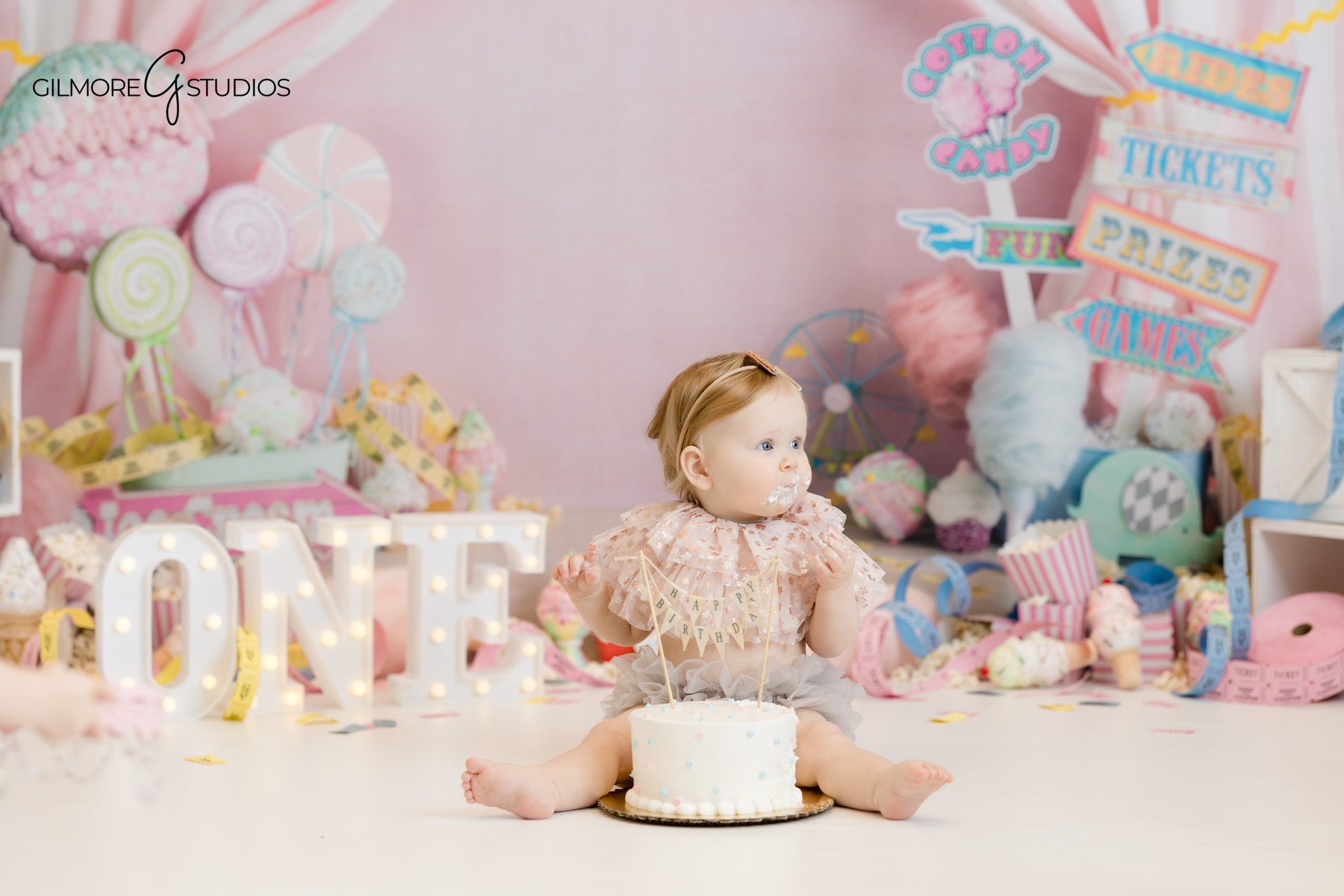 baby photography carnival cake smash setup
carnival cake smash photographer pastel theme