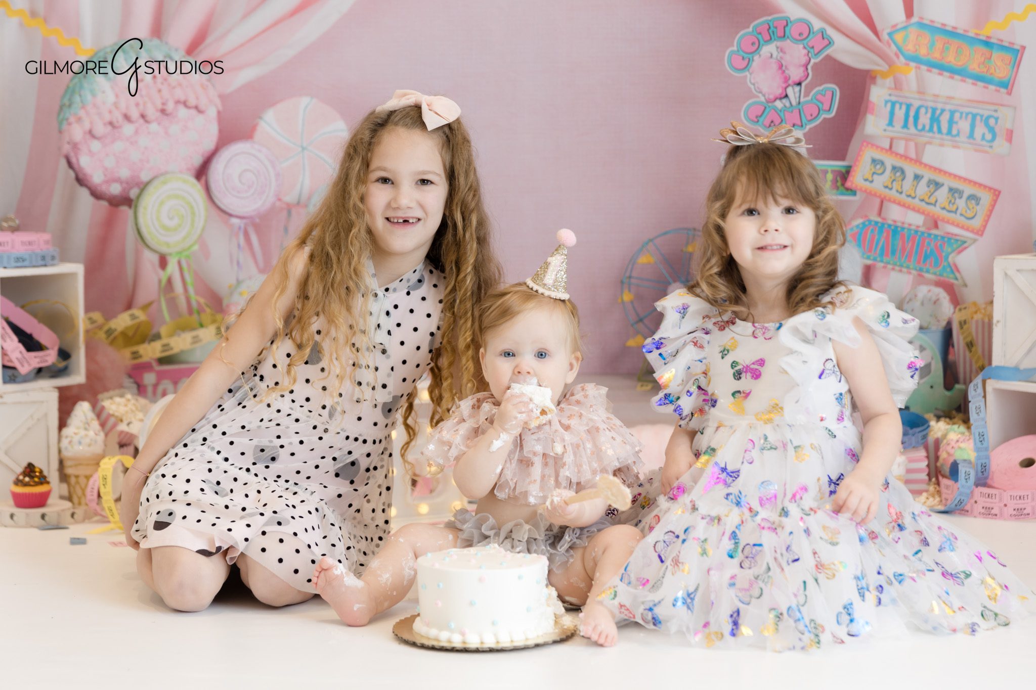 baby photography orange county first birthday
cake smash portrait with props carnival theme