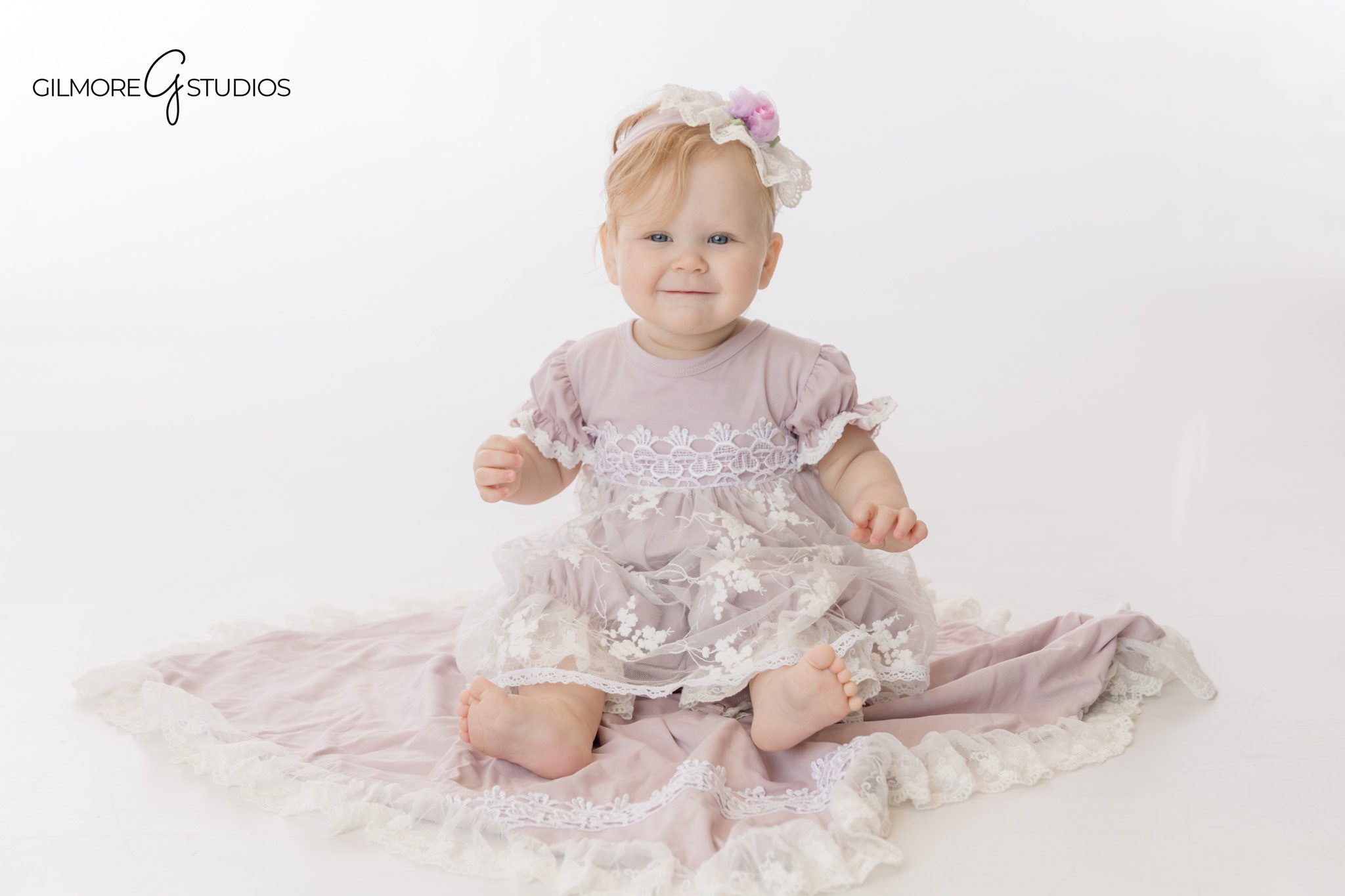 baby photography colorful carnival theme
carnival cake smash photographer one year old session