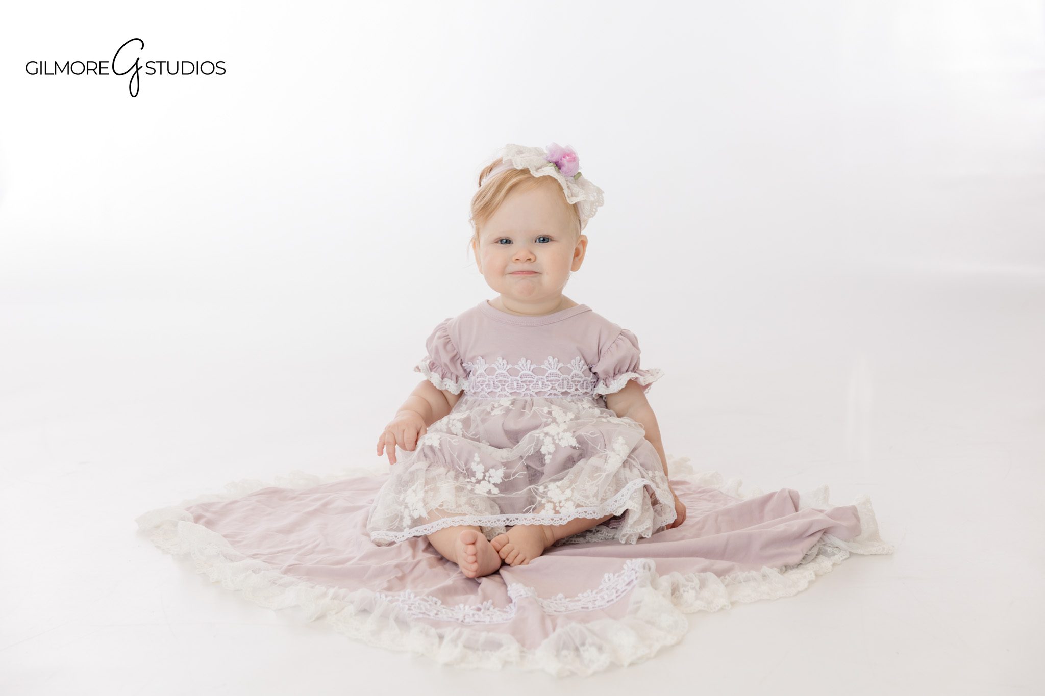 baby photography first birthday cake smash setup
cake smash portrait baby with carnival props