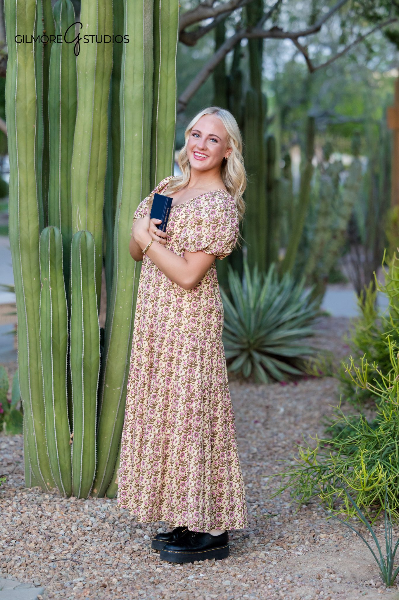 LDS missionary photographer Arizona temple portrait girl smiling holding flag | Temple missionary photos Arizona female