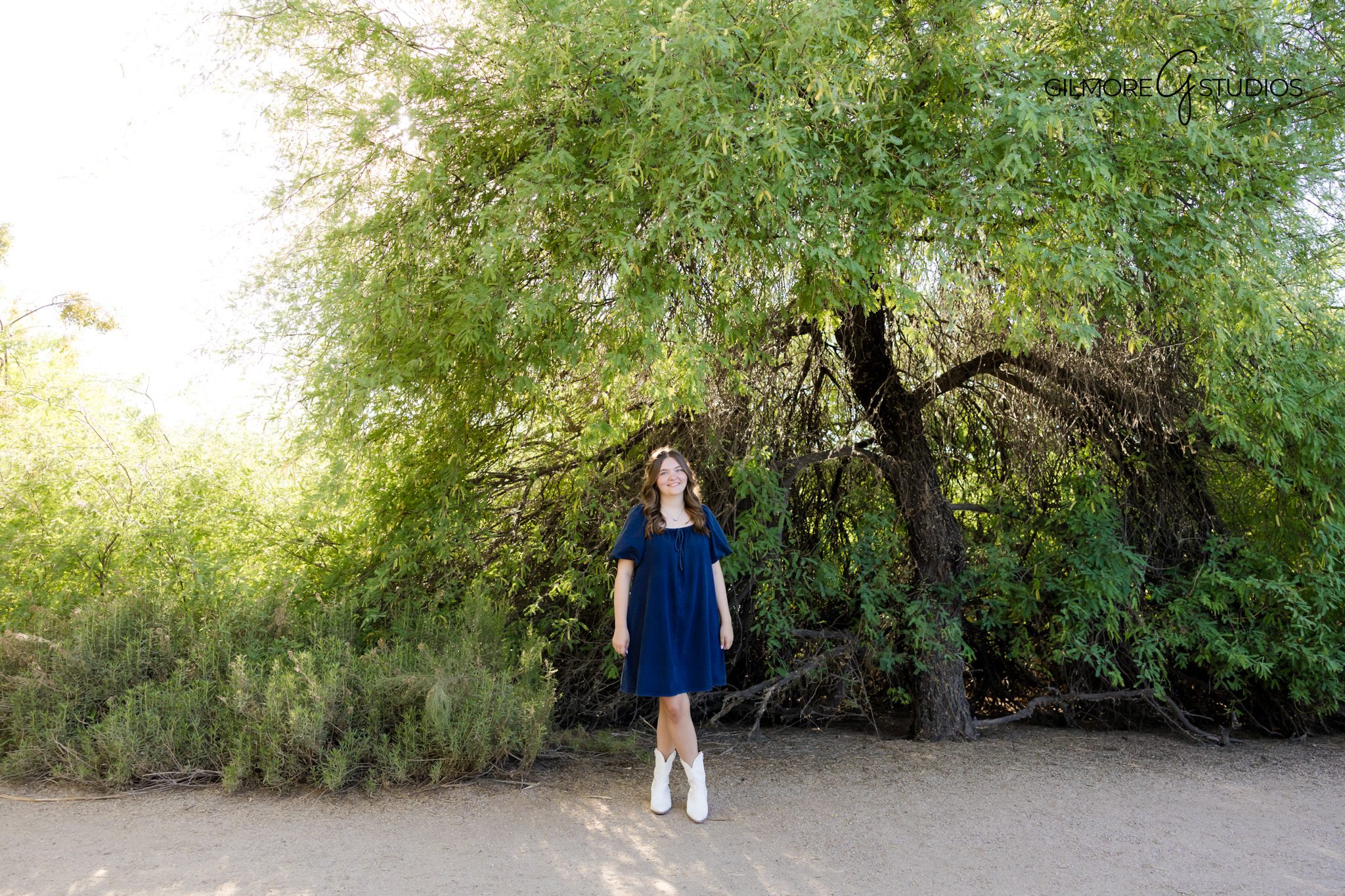 Senior portrait session Riparian Preserve Gilbert AZ pathway
Senior girl standing by nature trail Gilbert Arizona photoshoot