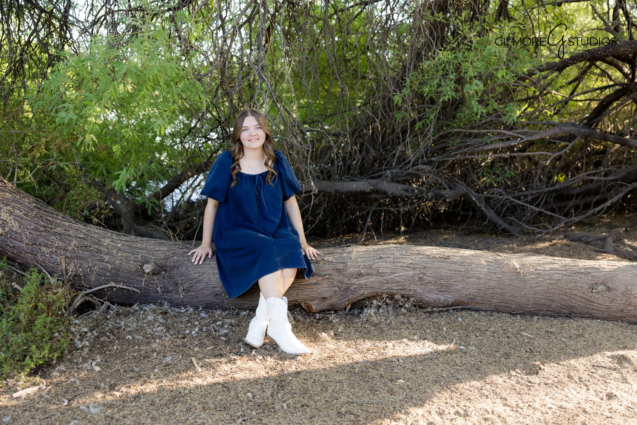 Senior session Gilbert AZ wooden fence greenery background
High school senior photos Gilbert Arizona casual outfit session