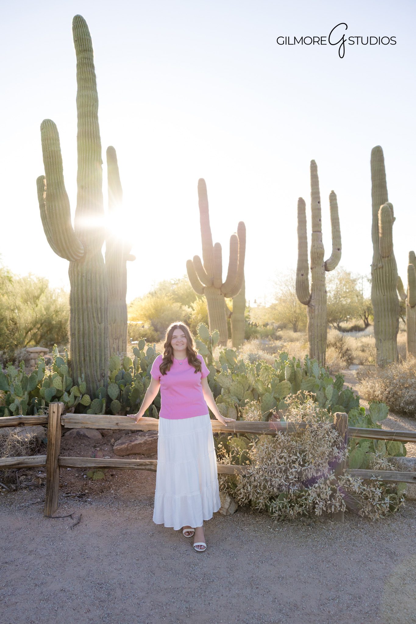 Senior girl portrait cactus background Gilbert Arizona photoshoot
Outdoor senior photos Gilbert AZ desert landscape cactus setting