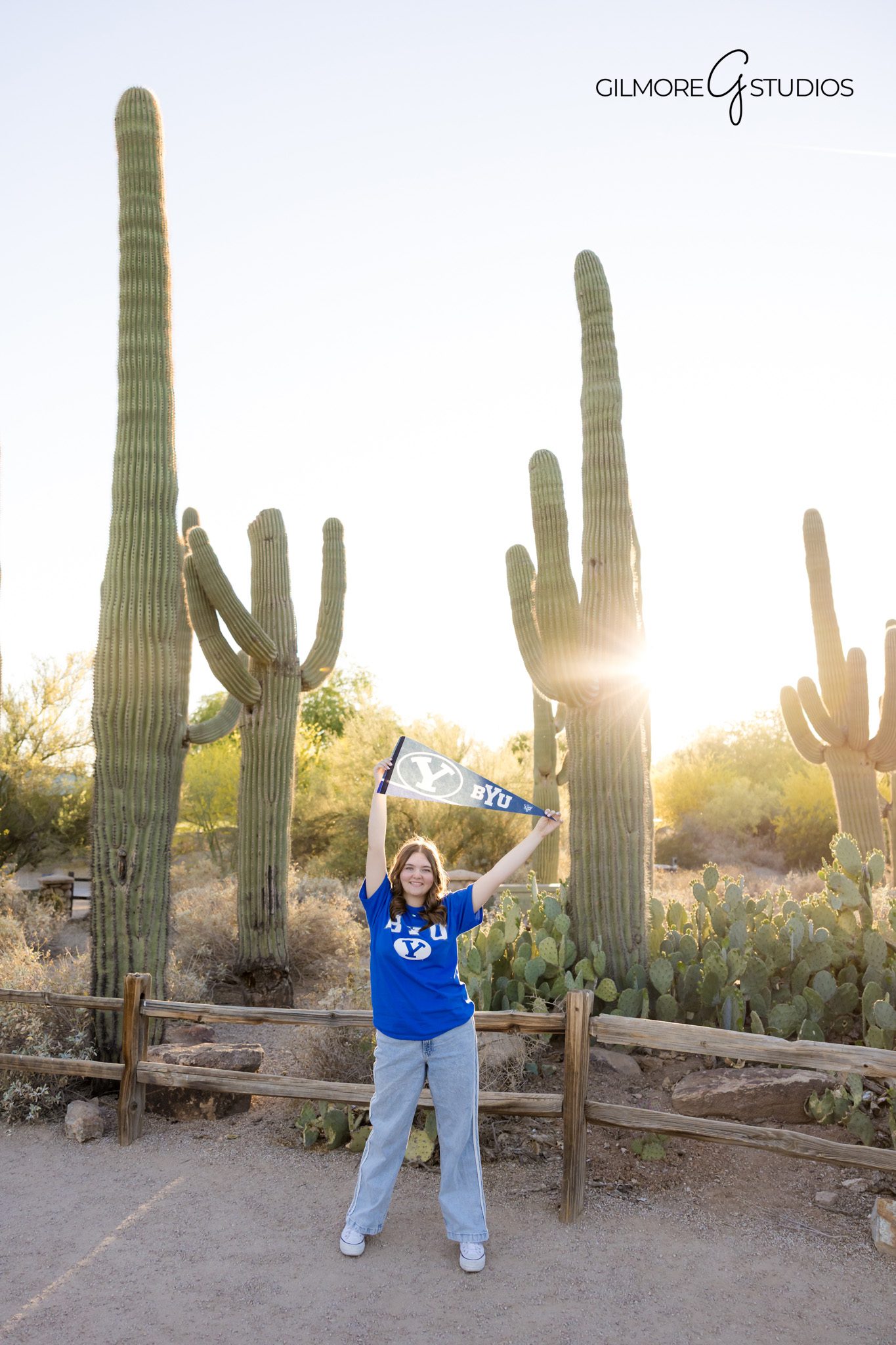 Senior photoshoot Riparian Preserve Gilbert wooden fence golden light
High school senior portrait Gilbert Arizona natural light photography