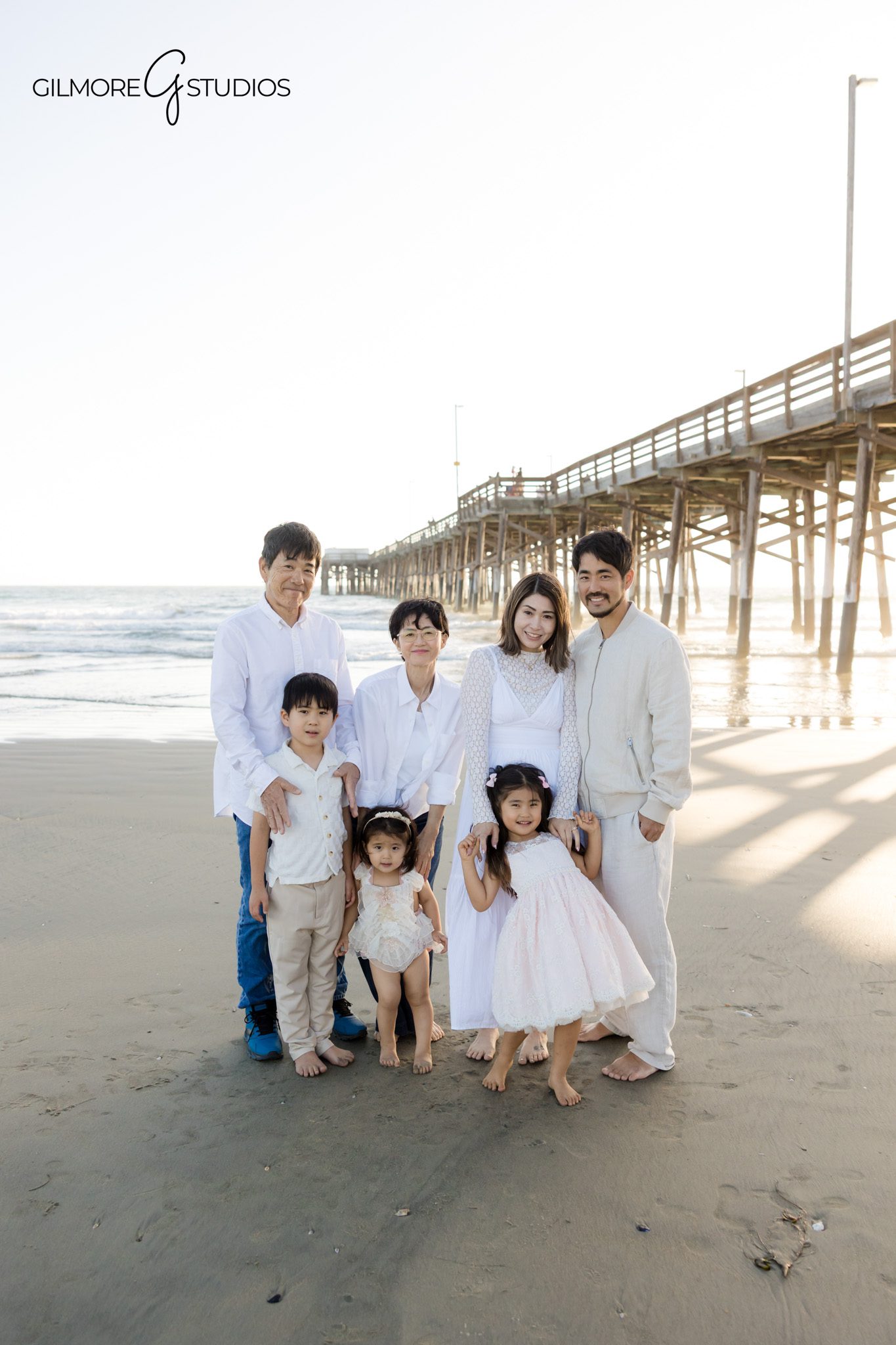 Family session at Newport Pier candid natural moment
Kids and grandparents beach family photography
