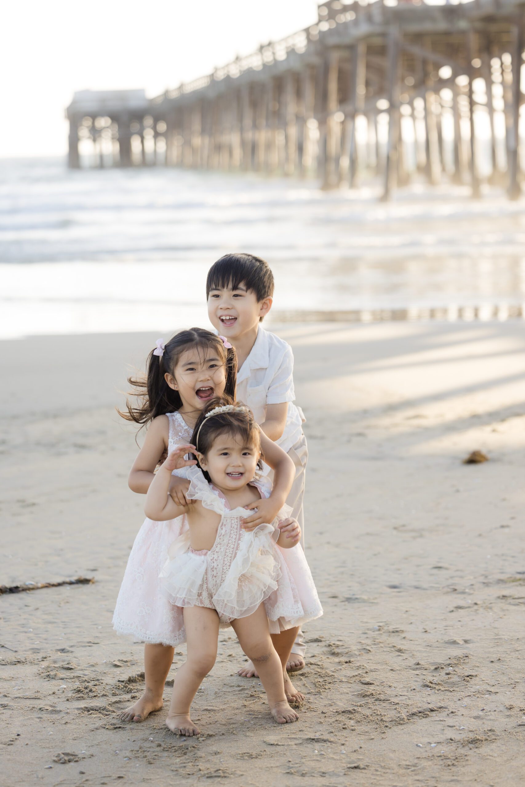 Family photography morning session calm beach
Sunrise family session Newport Beach pier