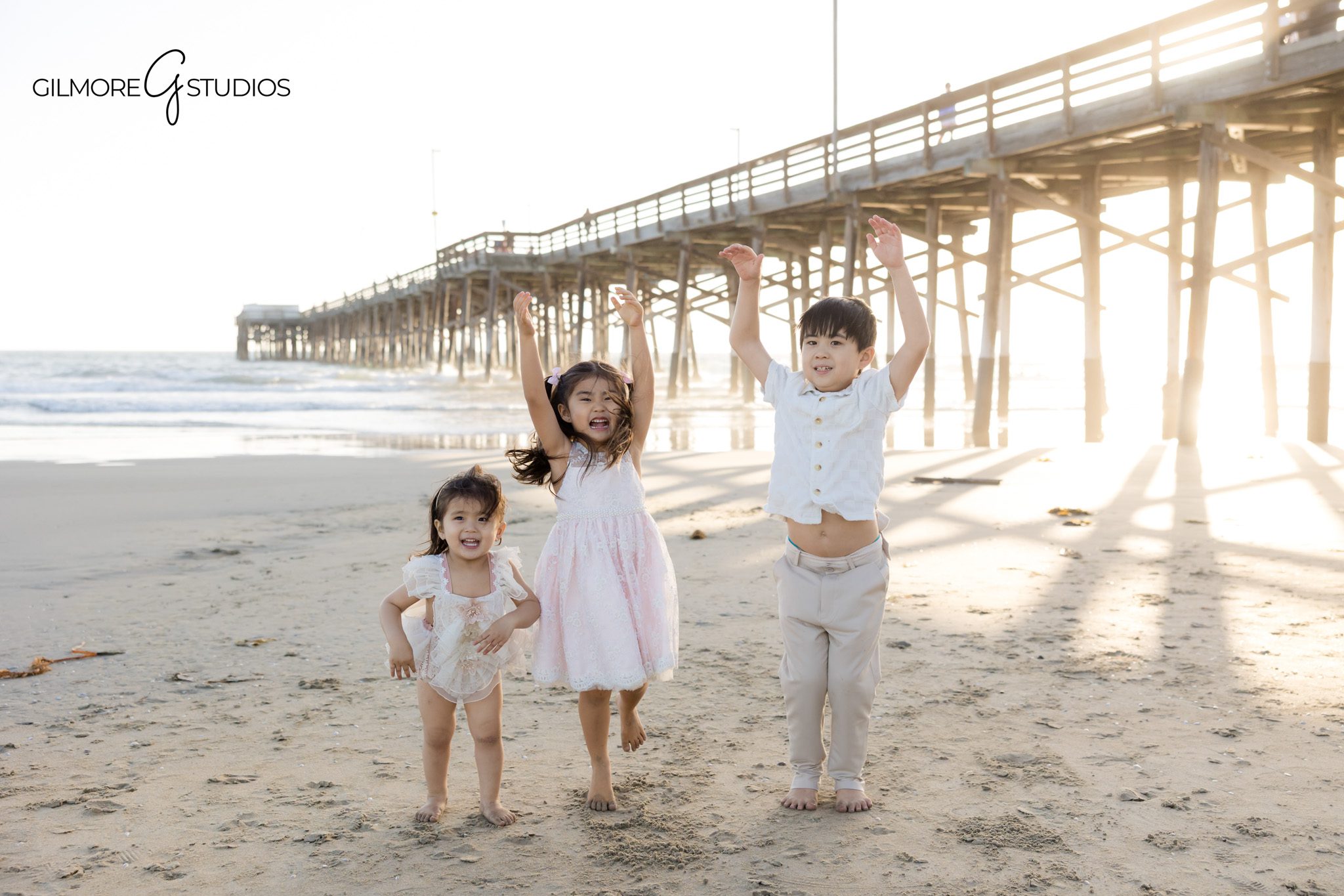 Family photos soft light ocean background
Beach photography early morning session