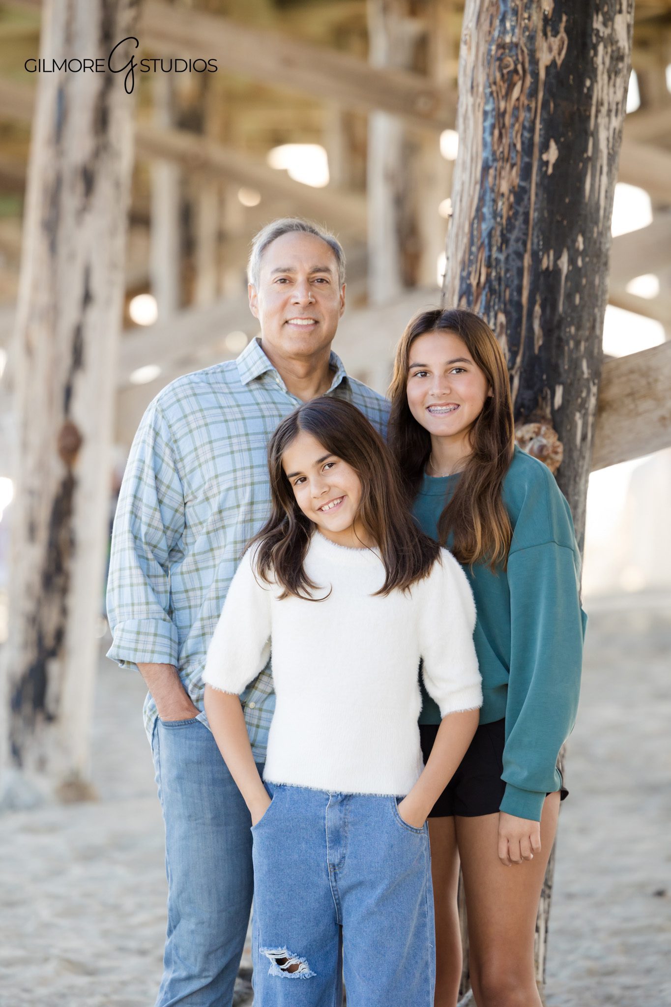 Newport Beach family photographer capturing walking candid beach moments
family photography Newport Pier sunset walking session beach portraits