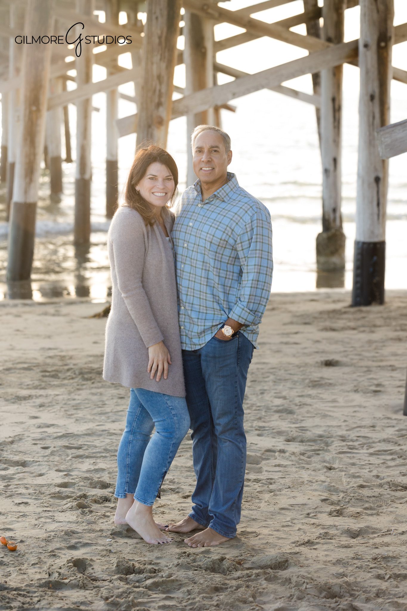 beach family session Newport California sunset glow images
coastal sunset family photography Newport Beach pier location