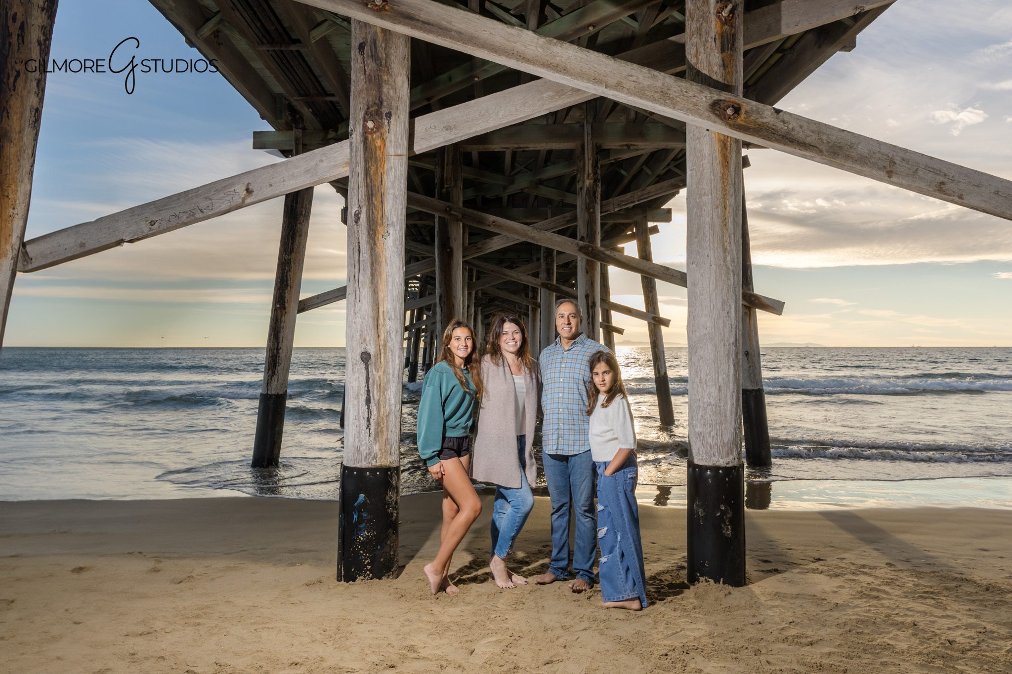 coastal family photography California pier structure composition
family photography Newport Beach creative pier framing