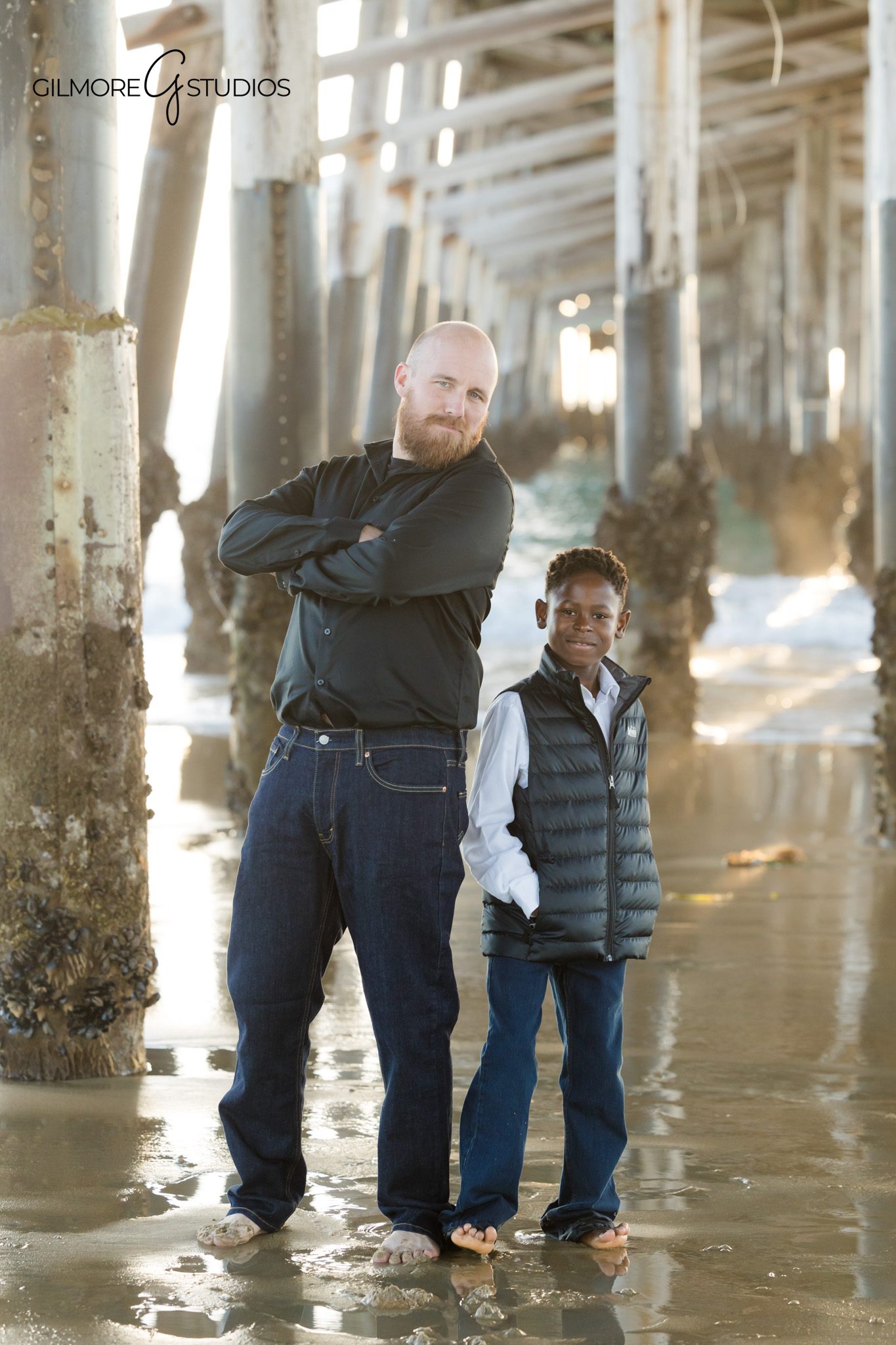 coastal family photography California centered pier structure portrait
beach family photos Newport Pier balanced composition