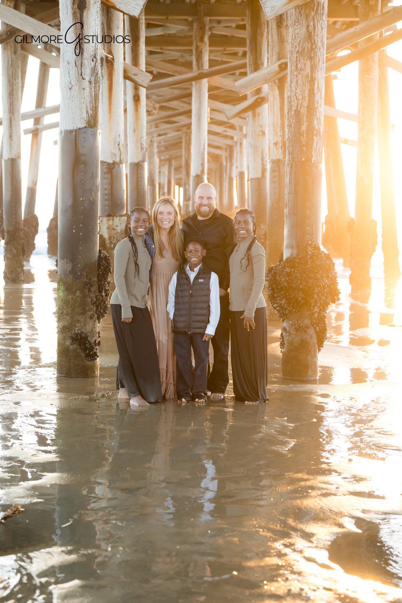 Newport Beach family photographer capturing kids close up smiling
Newport Pier family photography sibling portrait candid smiles