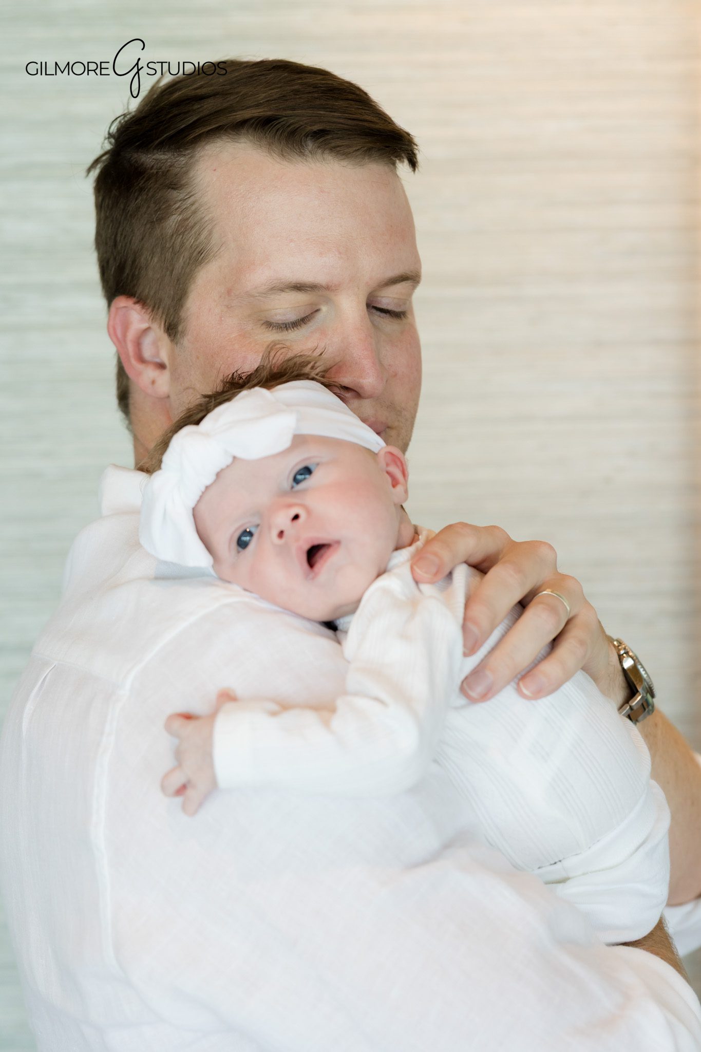Gilbert AZ newborn lifestyle photographer toddler smiling beside newborn
sibling newborn session Gilbert Arizona playful child interaction