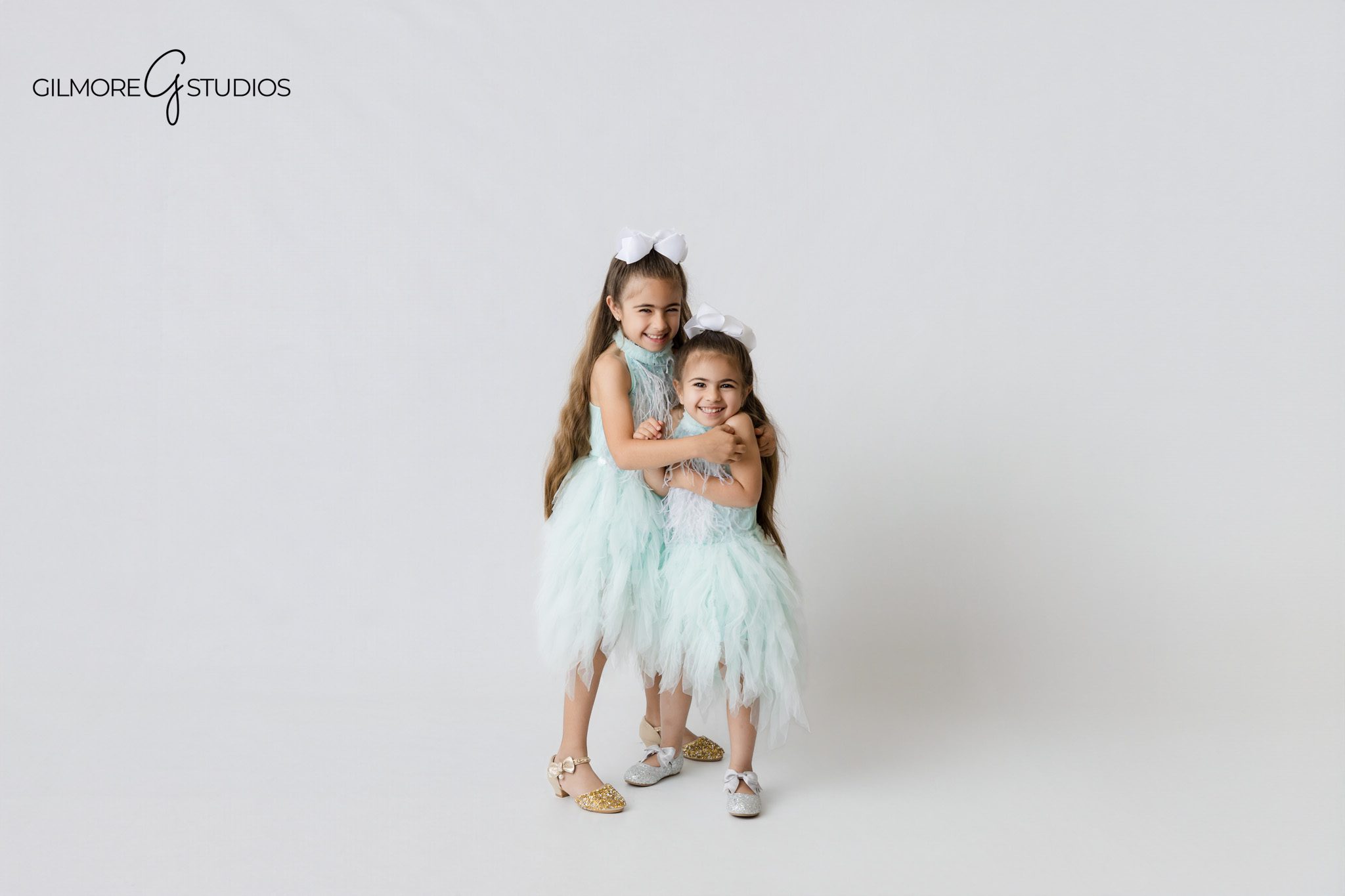 Gilbert AZ sibling birthday photography, sisters in matching aqua mermaid dresses