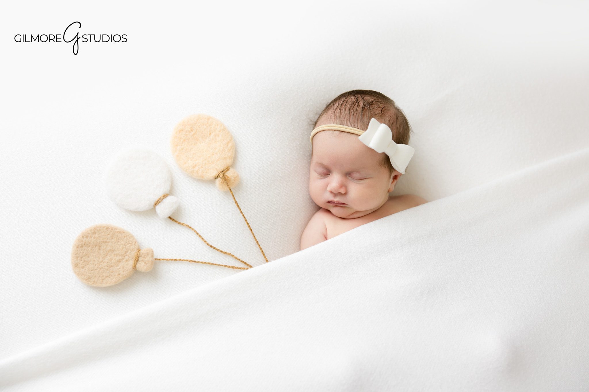 Newborn baby photography session in Gilbert AZ with timeless soft pink newborn styling