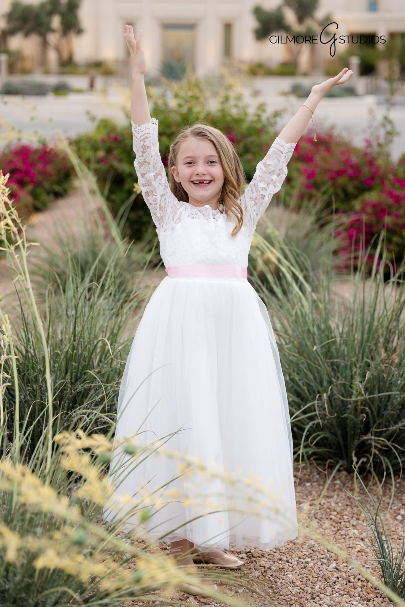Baptism portraits with temple fountains at Gilbert Arizona Temple
LDS baptism photography Gilbert Arizona with candid smiling portraits