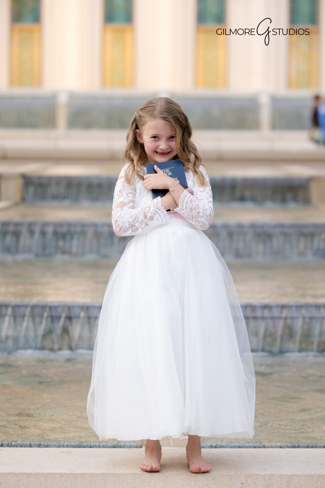 Temple baptism portraits in Gilbert Arizona with floral landscaping
Gilbert LDS baptism photographer capturing joyful baptism milestone portraits