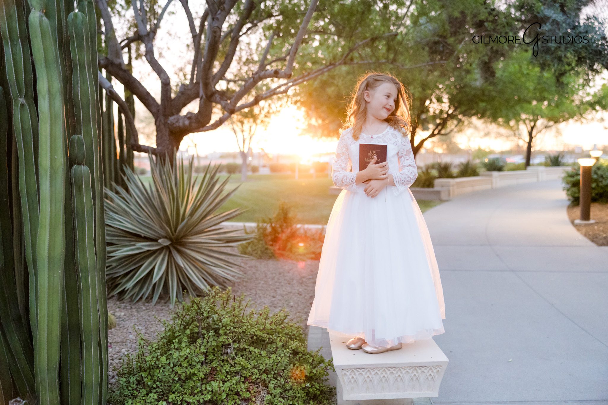 LDS baptism portrait photographer in Gilbert Arizona with temple flowers
Gilbert Arizona Temple baptism portraits with little girl in white lace dress