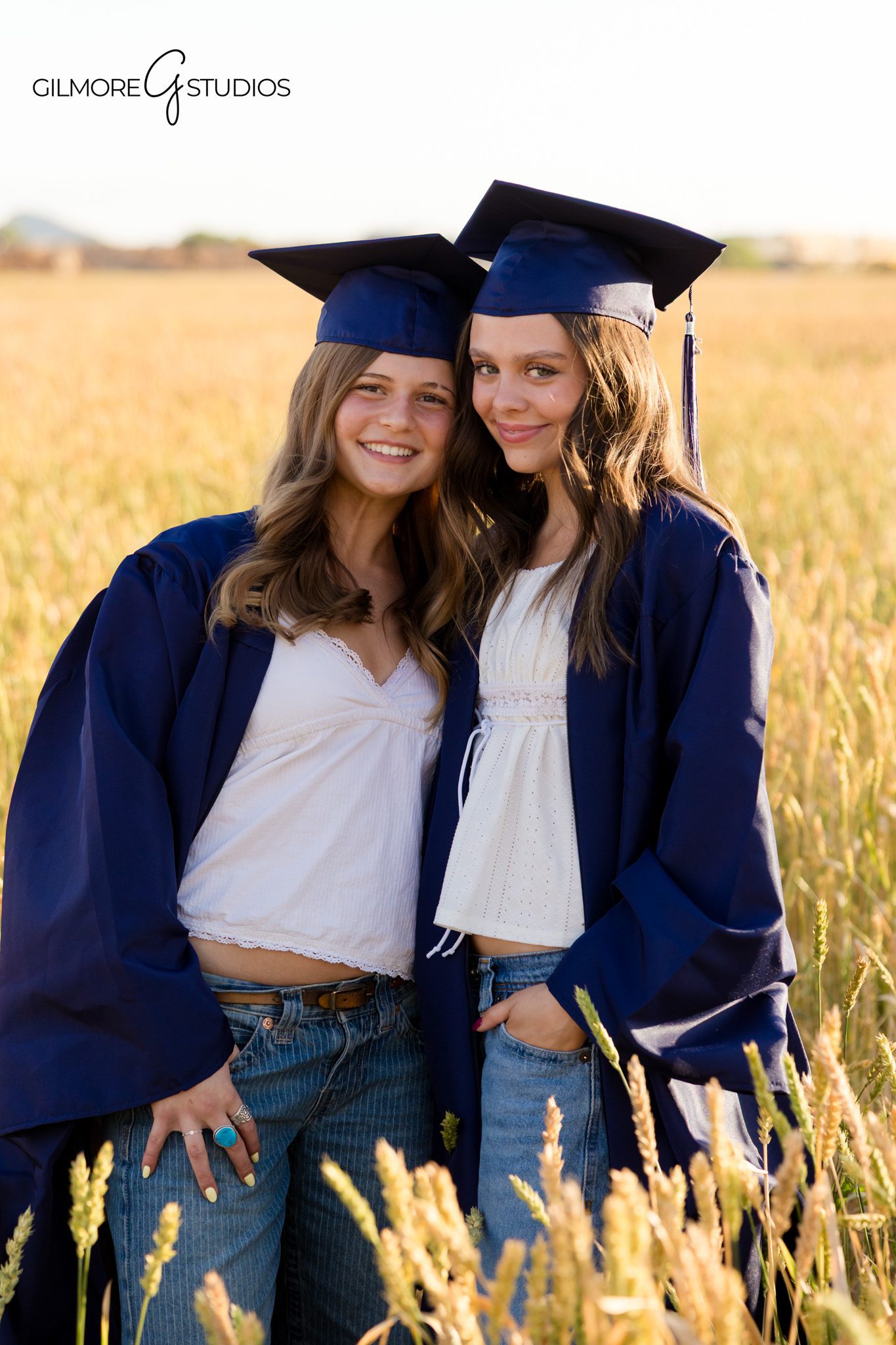 Arizona senior portrait photography with best friends outdoors
Queen Creek high school senior girls cap and gown session