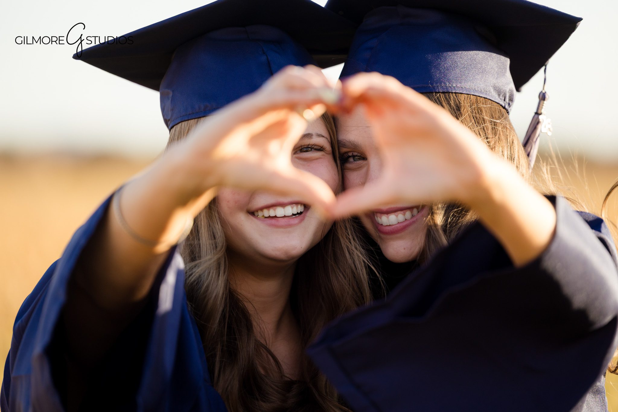 Queen Creek senior girls graduation portraits in blue cap and gown
Best friend senior graduation photos in Queen Creek Arizona