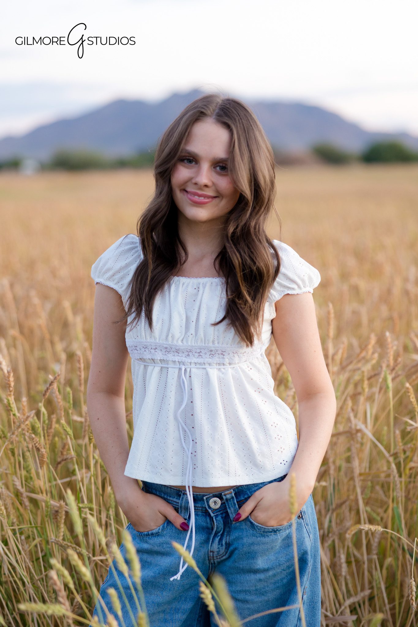 High school senior girls photographer Gilbert AZ
Queen Creek senior graduation portraits in wheat field