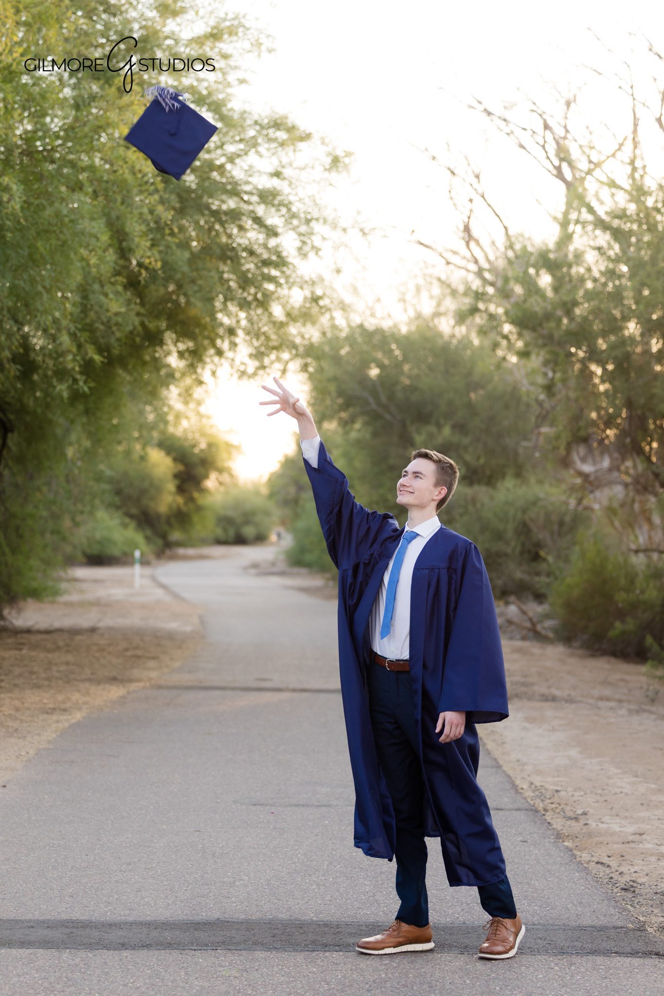 Senior boy graduation photos in Queen Creek AZ
Queen Creek senior photographer cap and gown portrait