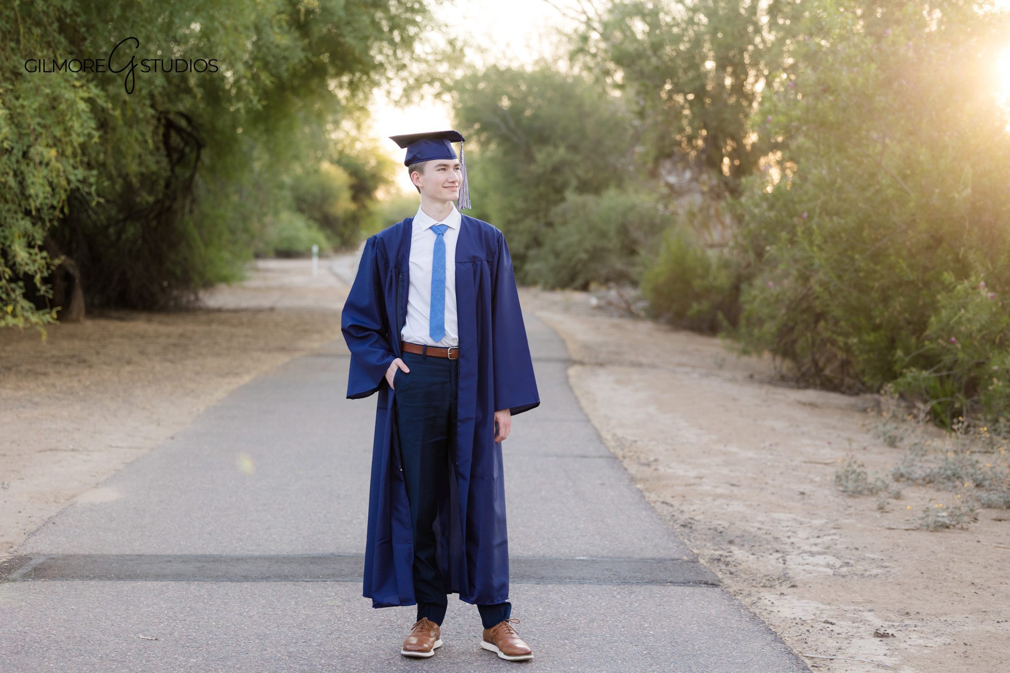 Outdoor senior cap and gown photos Arizona
Queen Creek senior boy photographer