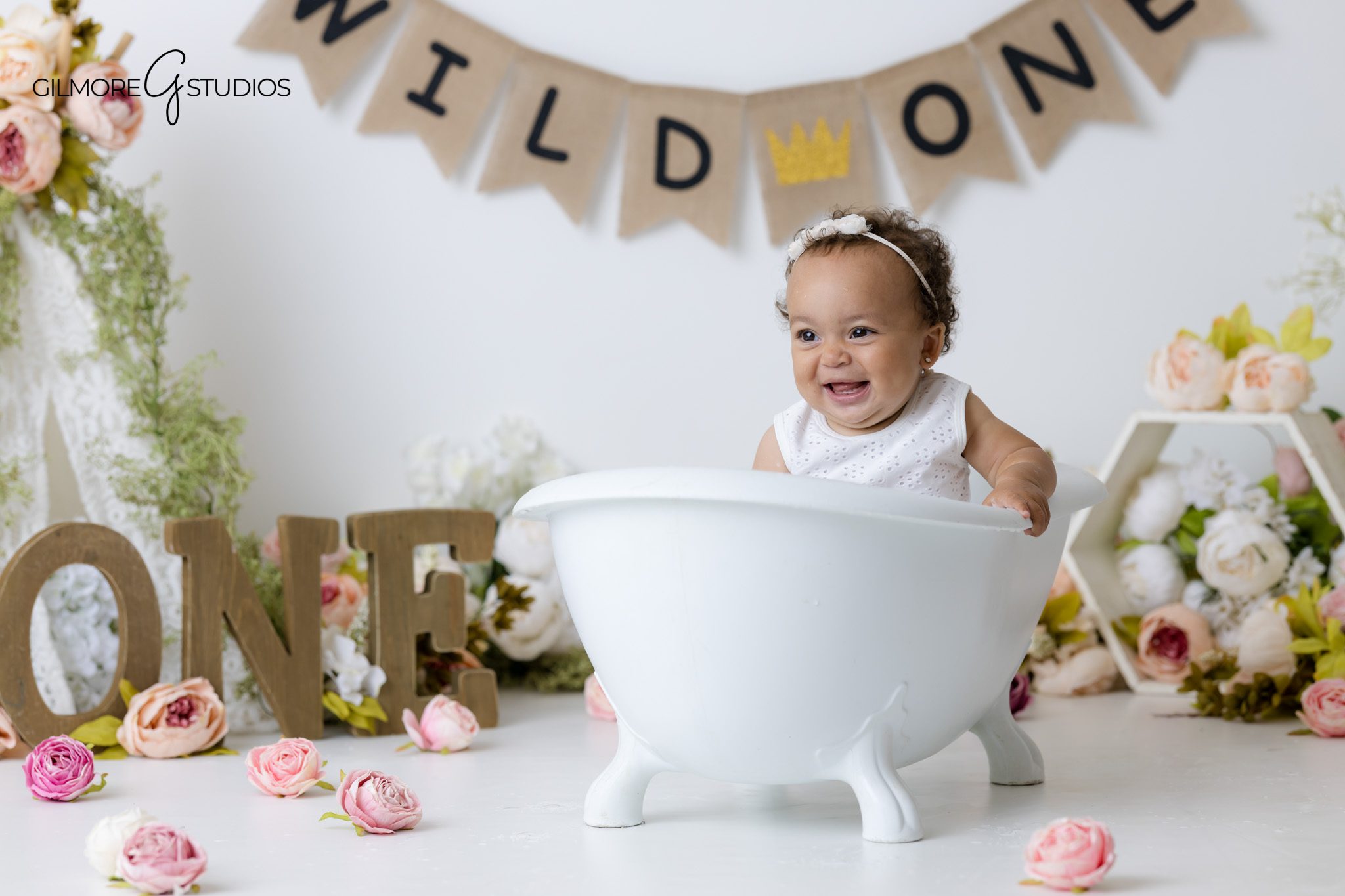 Cake smash photographer near Gilbert Arizona for elegant baby girl first birthday portraits