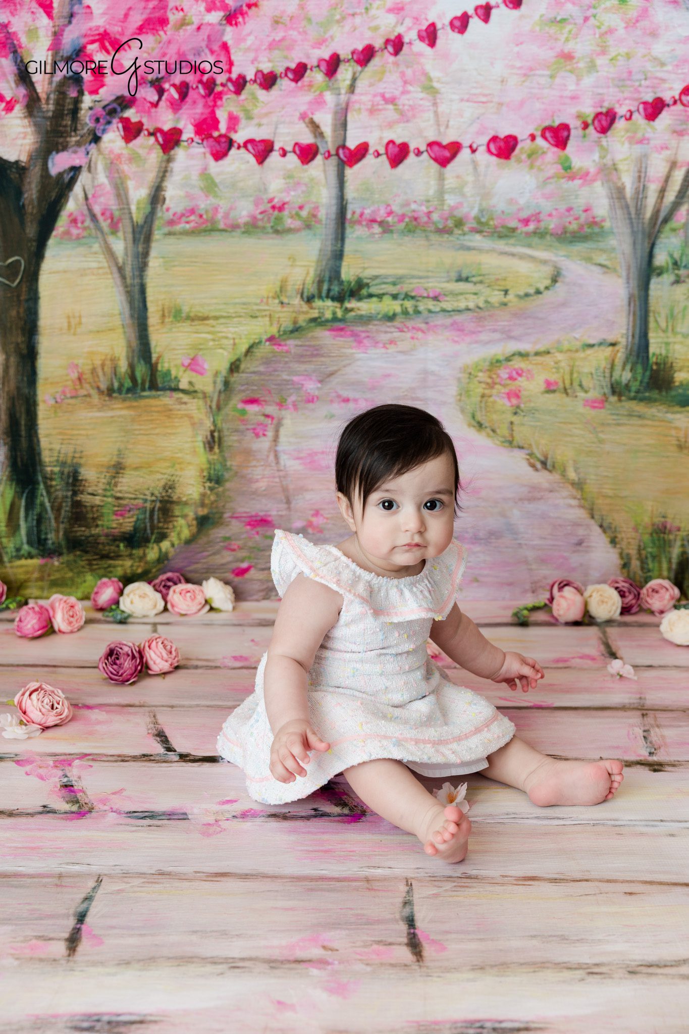 Spring baby photos in Newport Beach with soft neutral studio styling
Baby milestone portrait with baby sitting independently in Newport Beach studio
