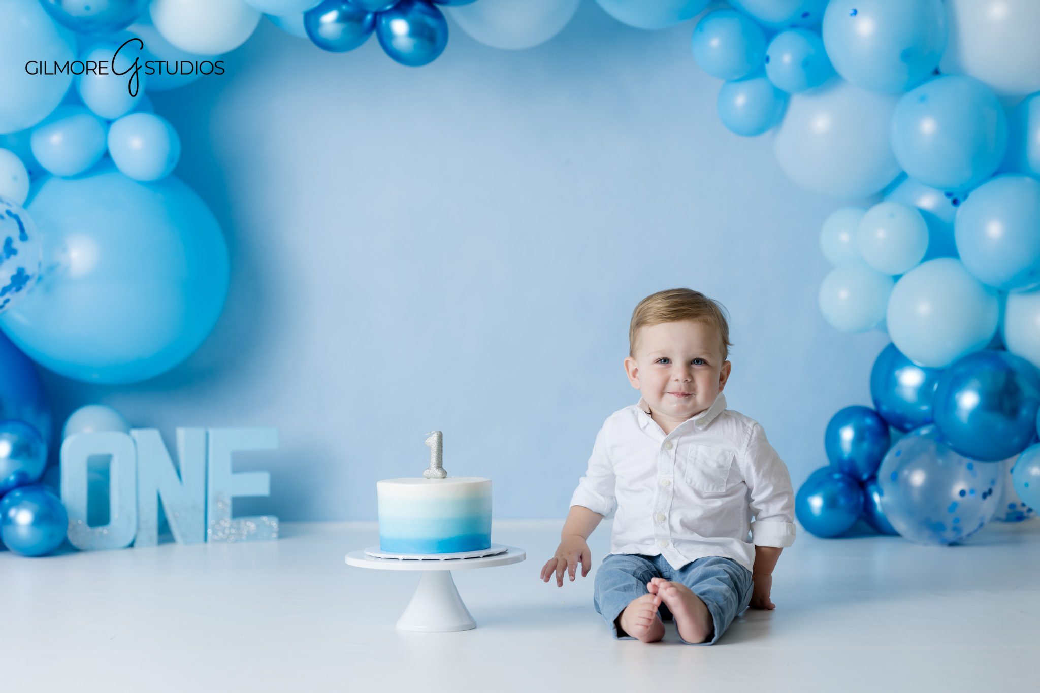 One year old milestone photography Queen Creek
Blue and white cake smash setup Arizona
