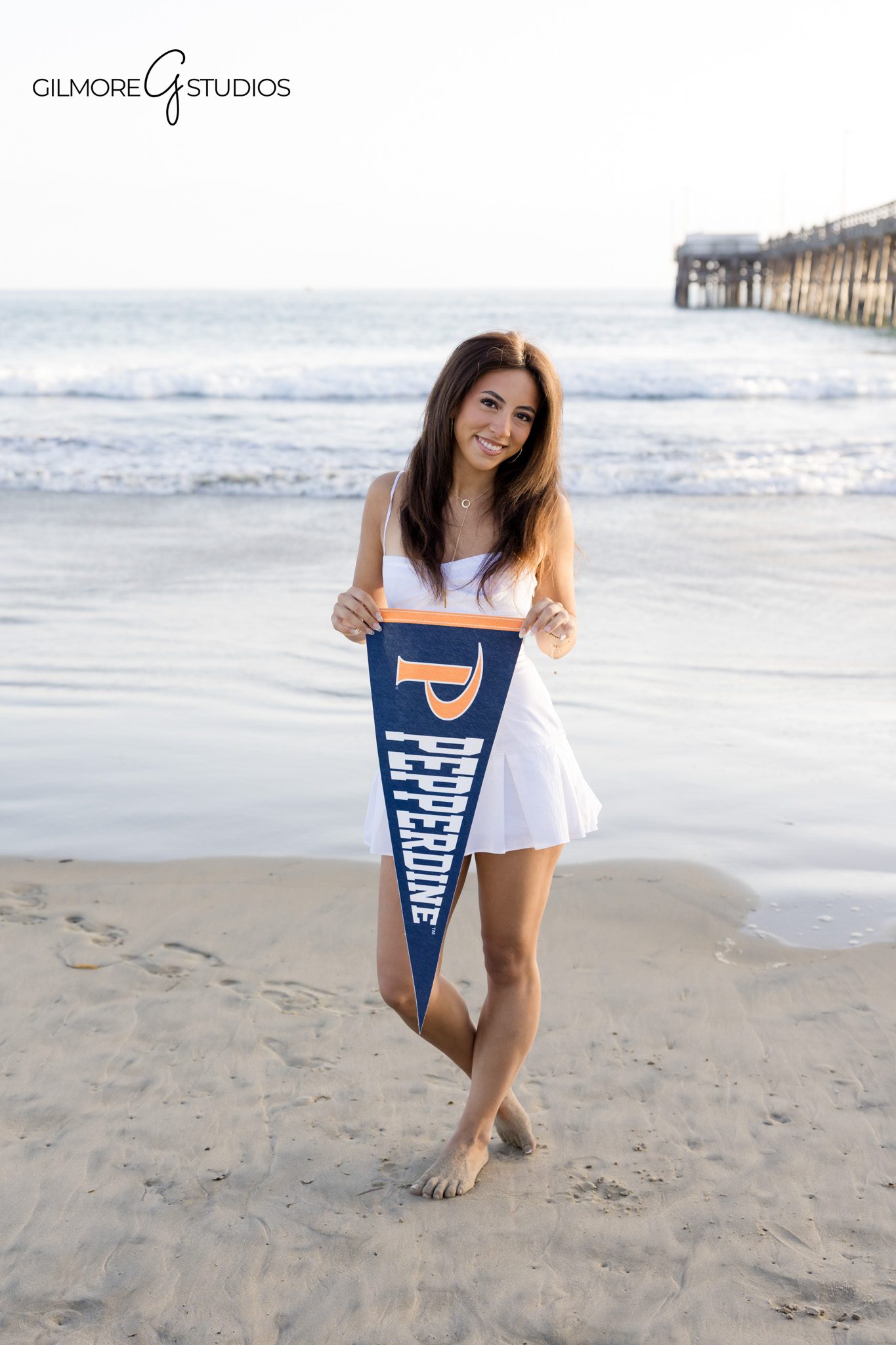 Senior girl portraits at Newport Beach California
Newport Pier graduation photography session