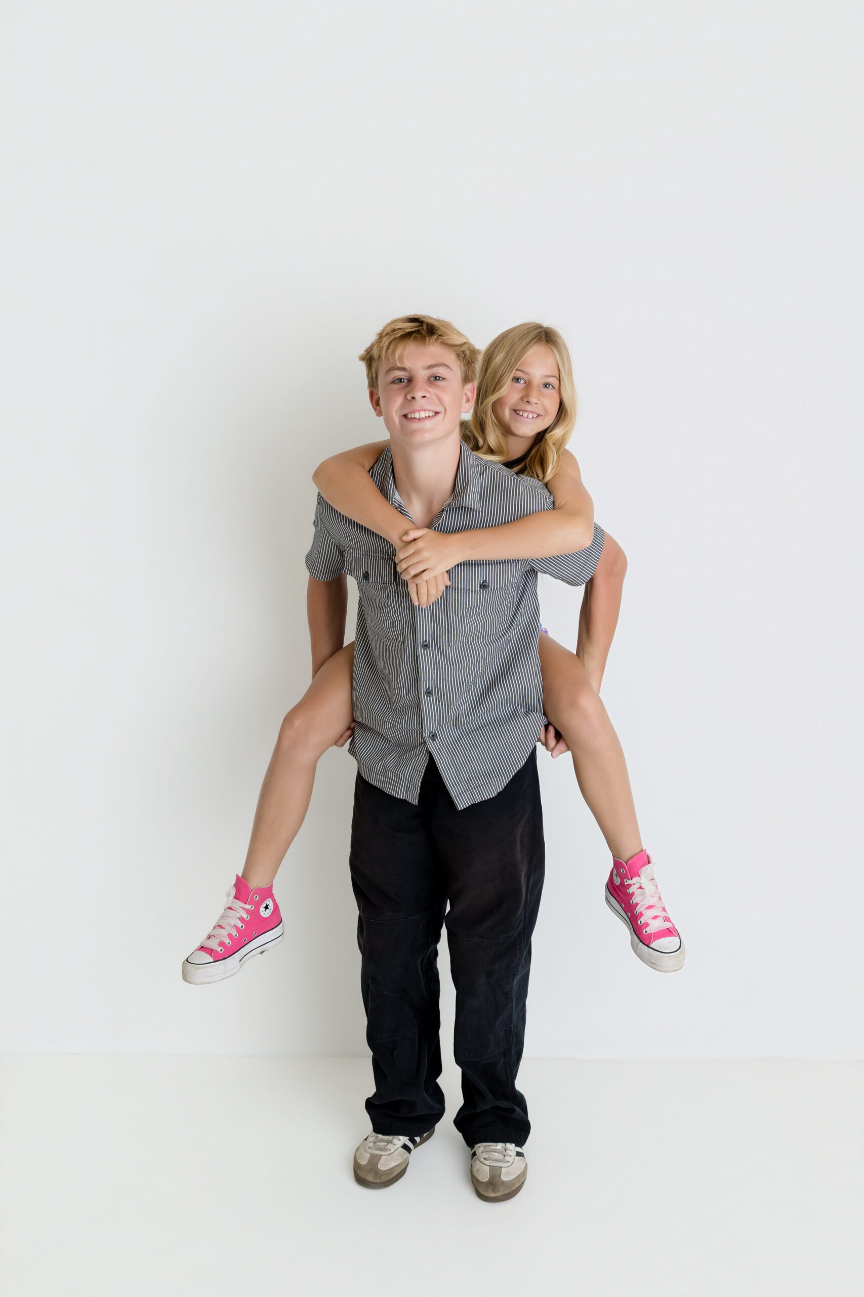 Kids personality session at Gilmore Studios
Sibling portraits with natural expressions