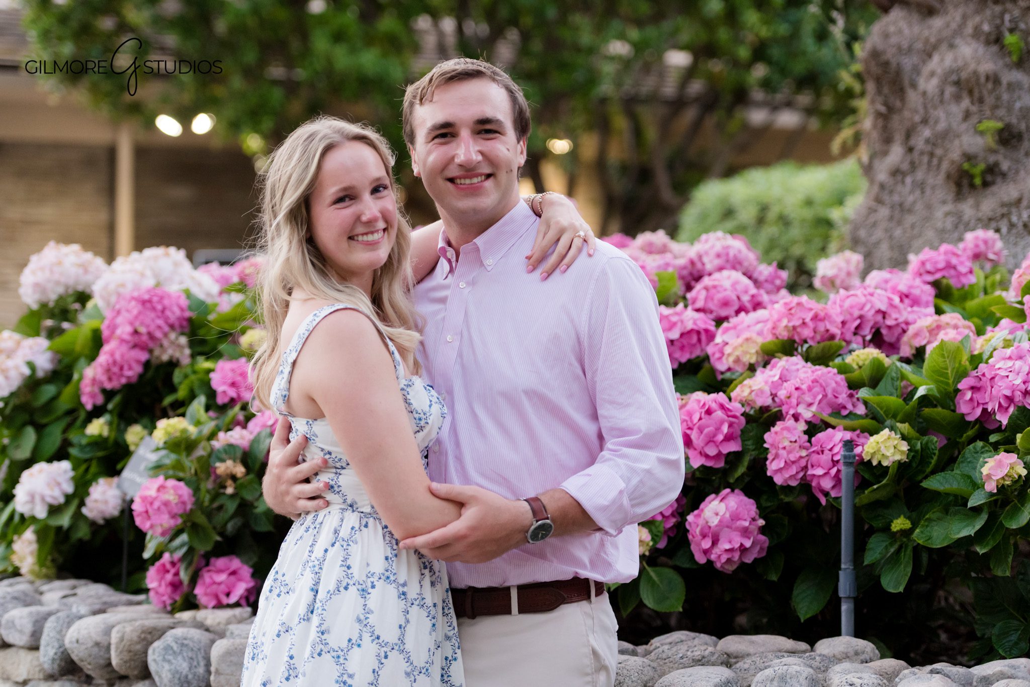 Laguna Beach surprise proposal photos with soft coastal cliffs in the background
Couple embracing on the beach after a romantic Emerald Bay engagement